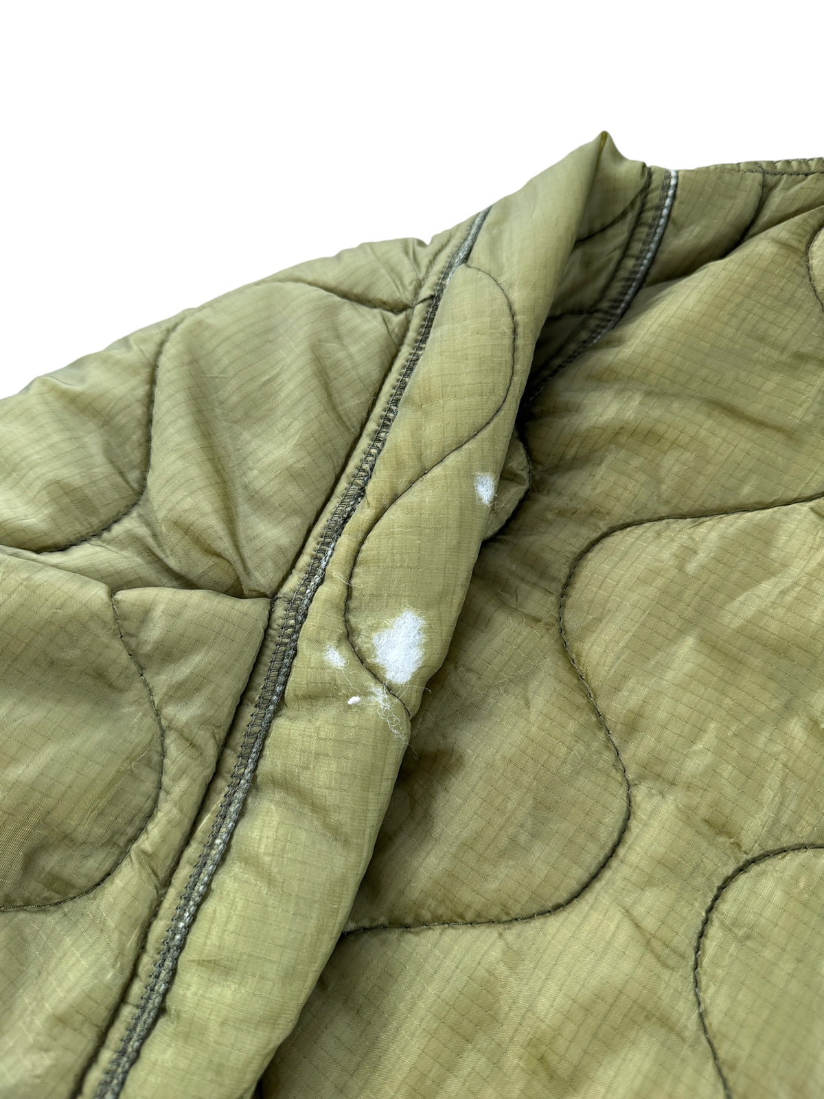 Ware on sleeve of Vintage Military Parka Liner Jacket SZ M