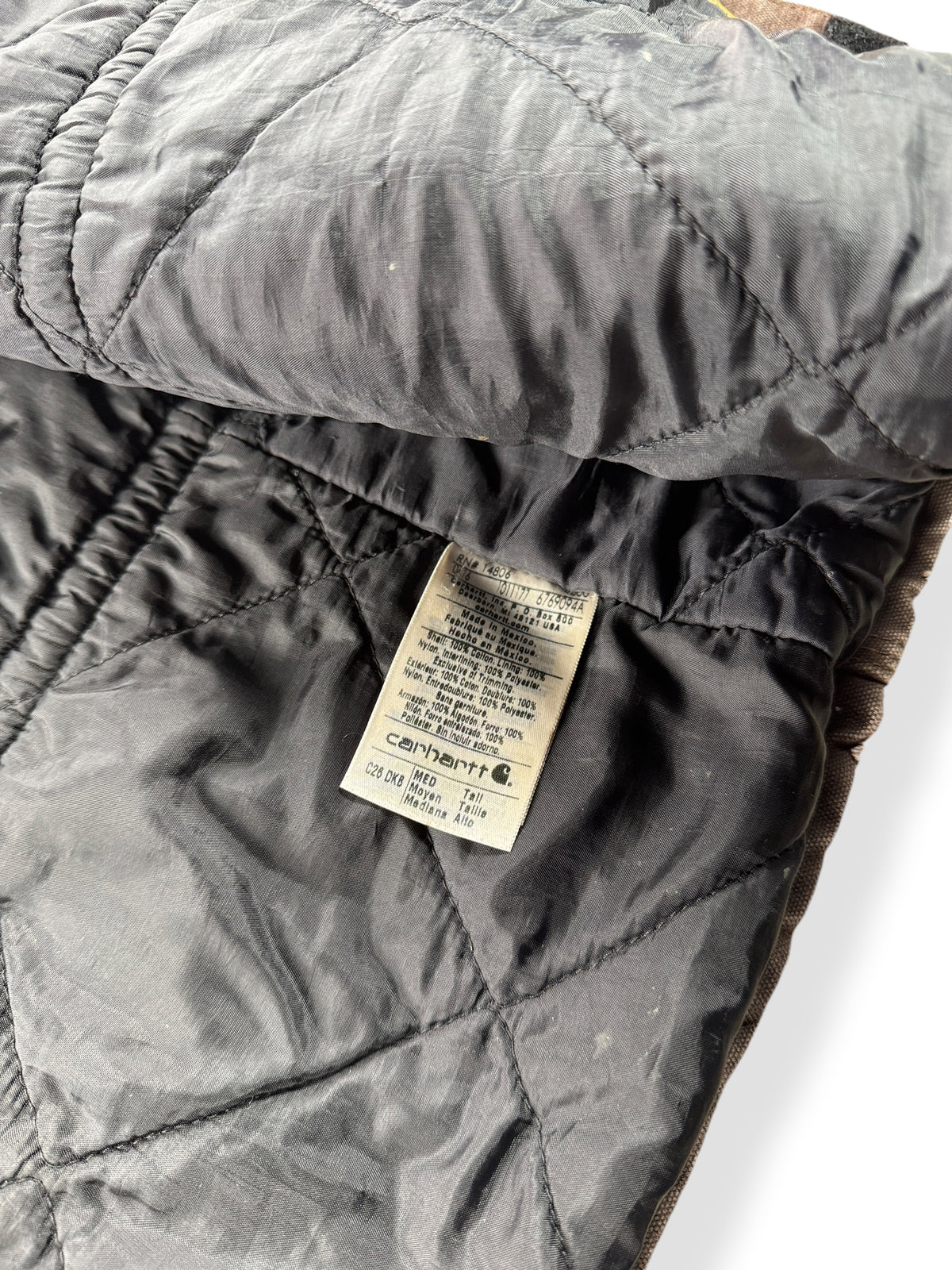 Inner tag on Vintage Carhartt Arctic Jacket Faded Brown SZ M-T