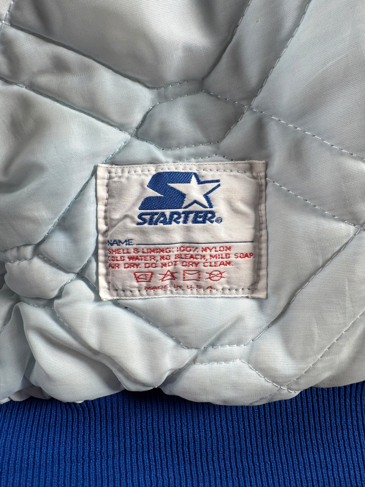 Inner tag on Vintage Seattle Seahawks Starter Jacket SZ XL