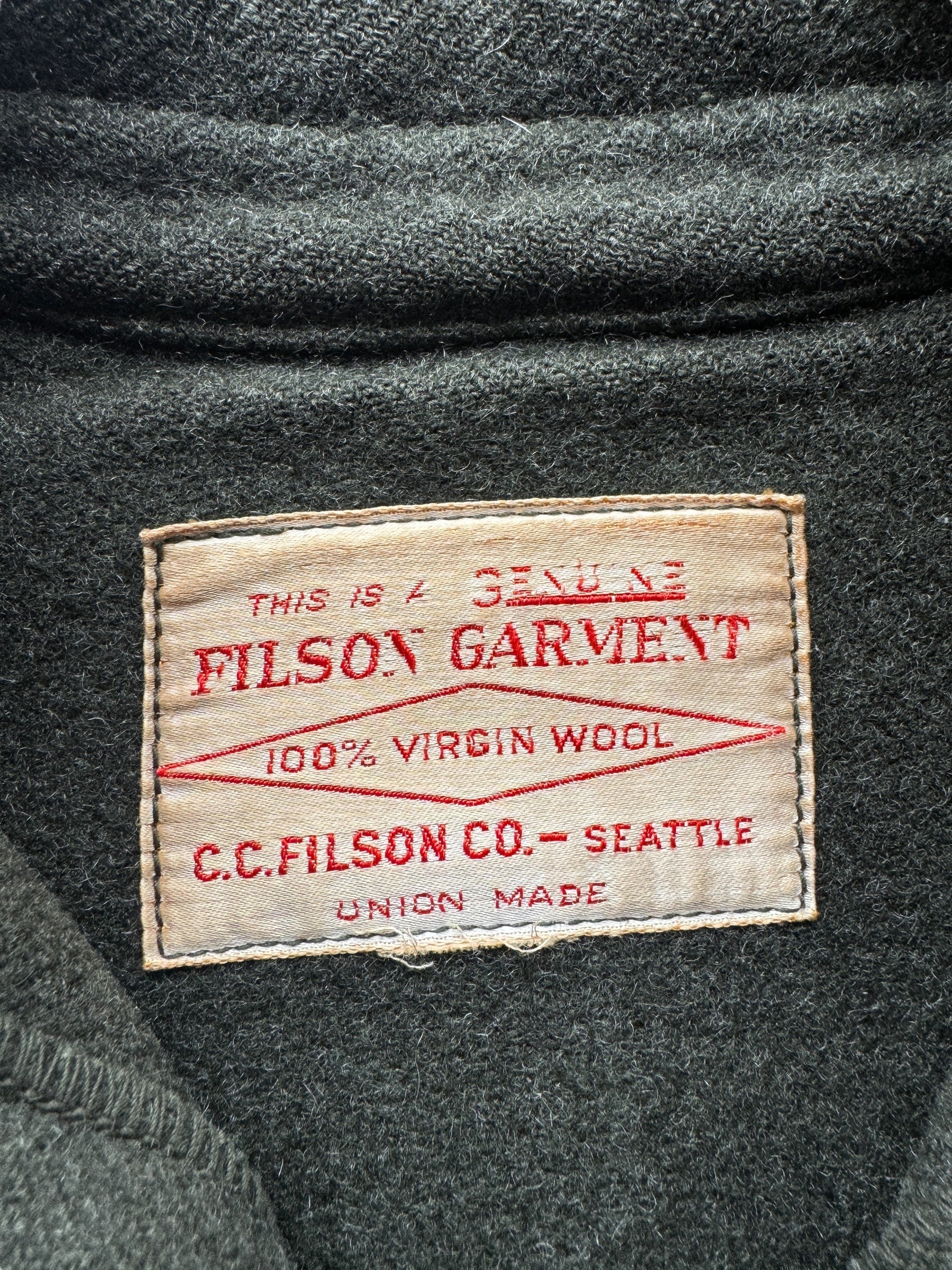 Label on Vintage Filson Union Made Forest Green Cruiser SZ XL