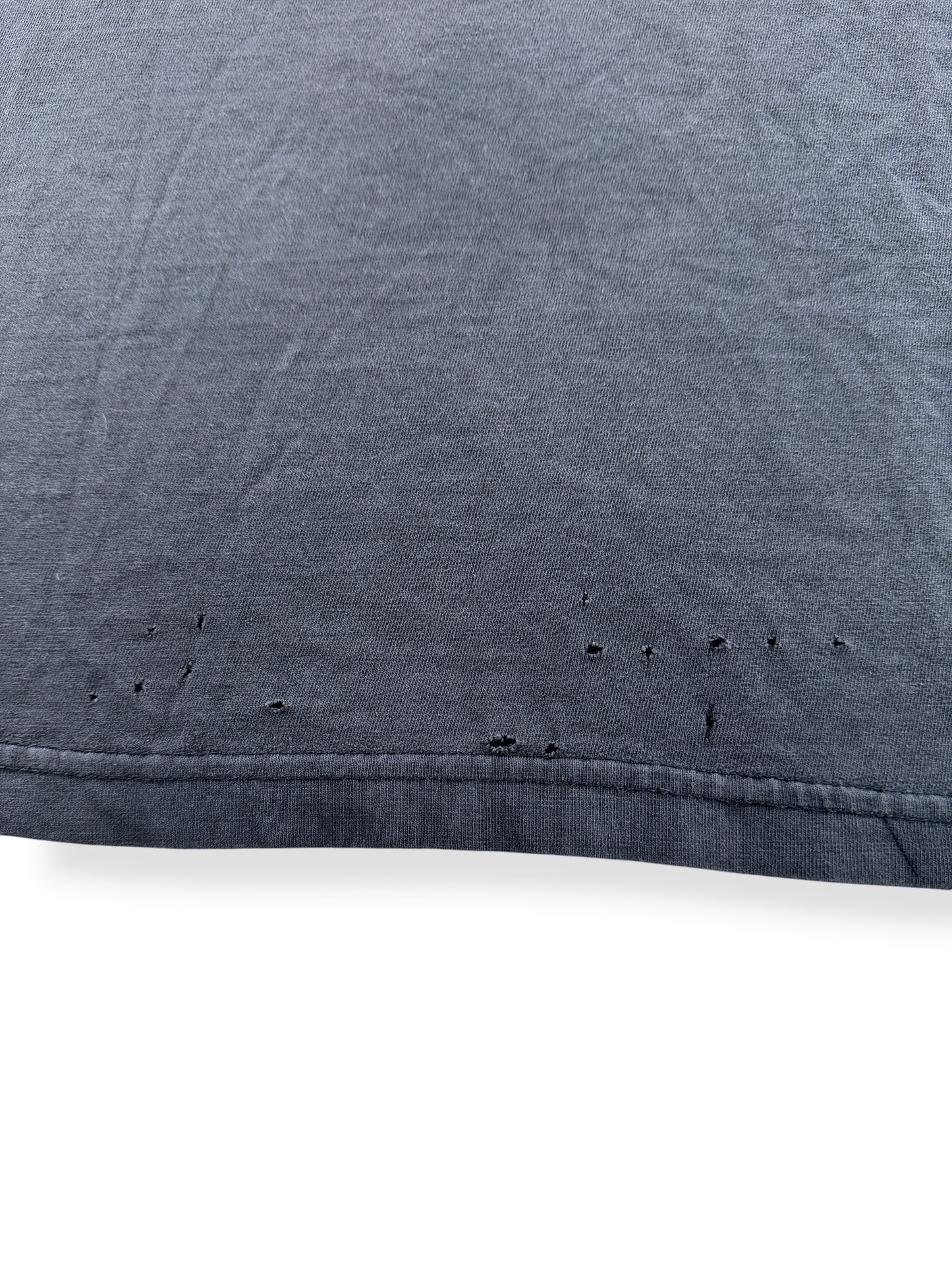 Holes on back of Vintage 2002 Distressed Ozzy Jaws Tee SZ L