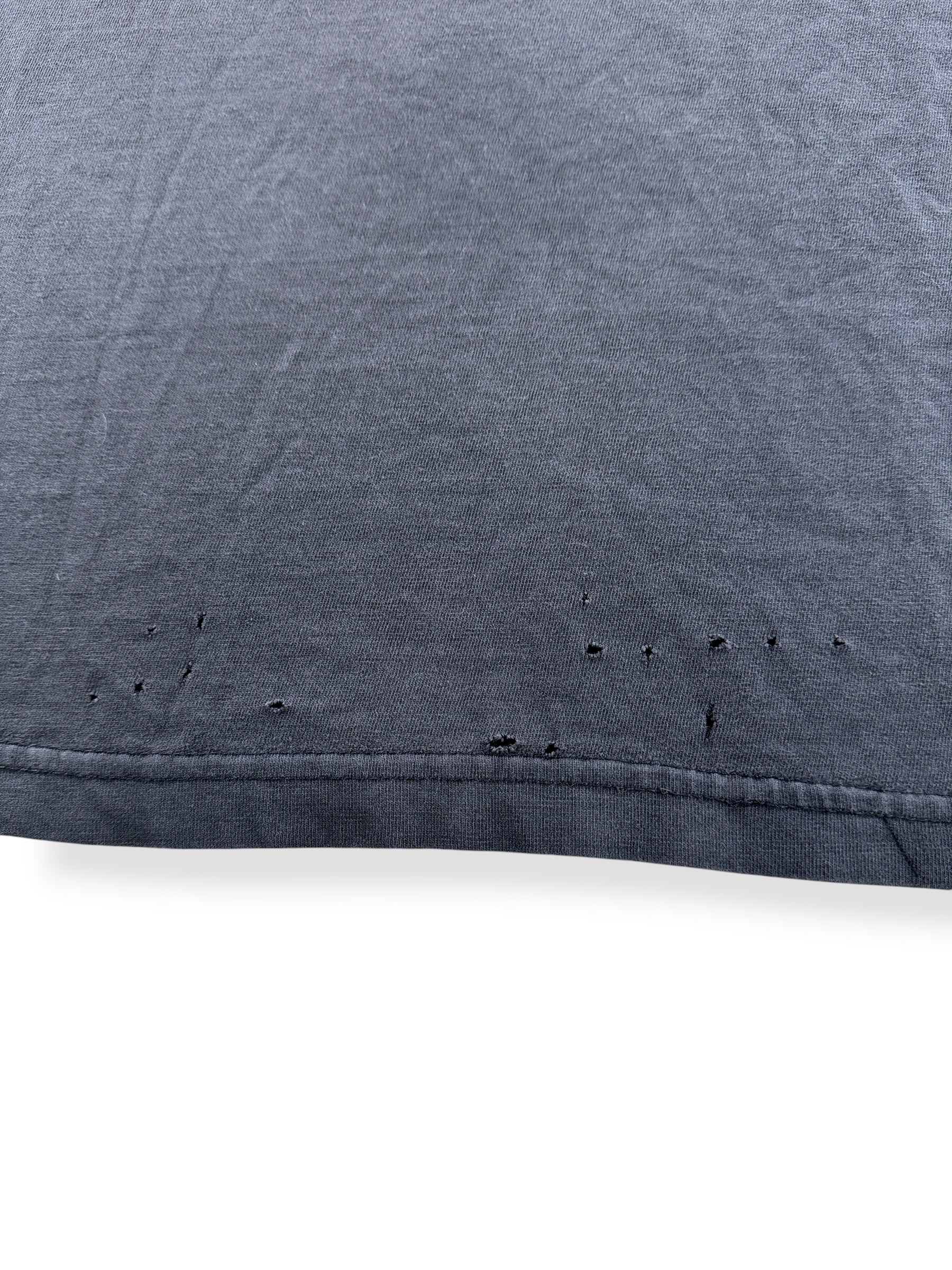 Holes on back of Vintage 2002 Distressed Ozzy Jaws Tee SZ L