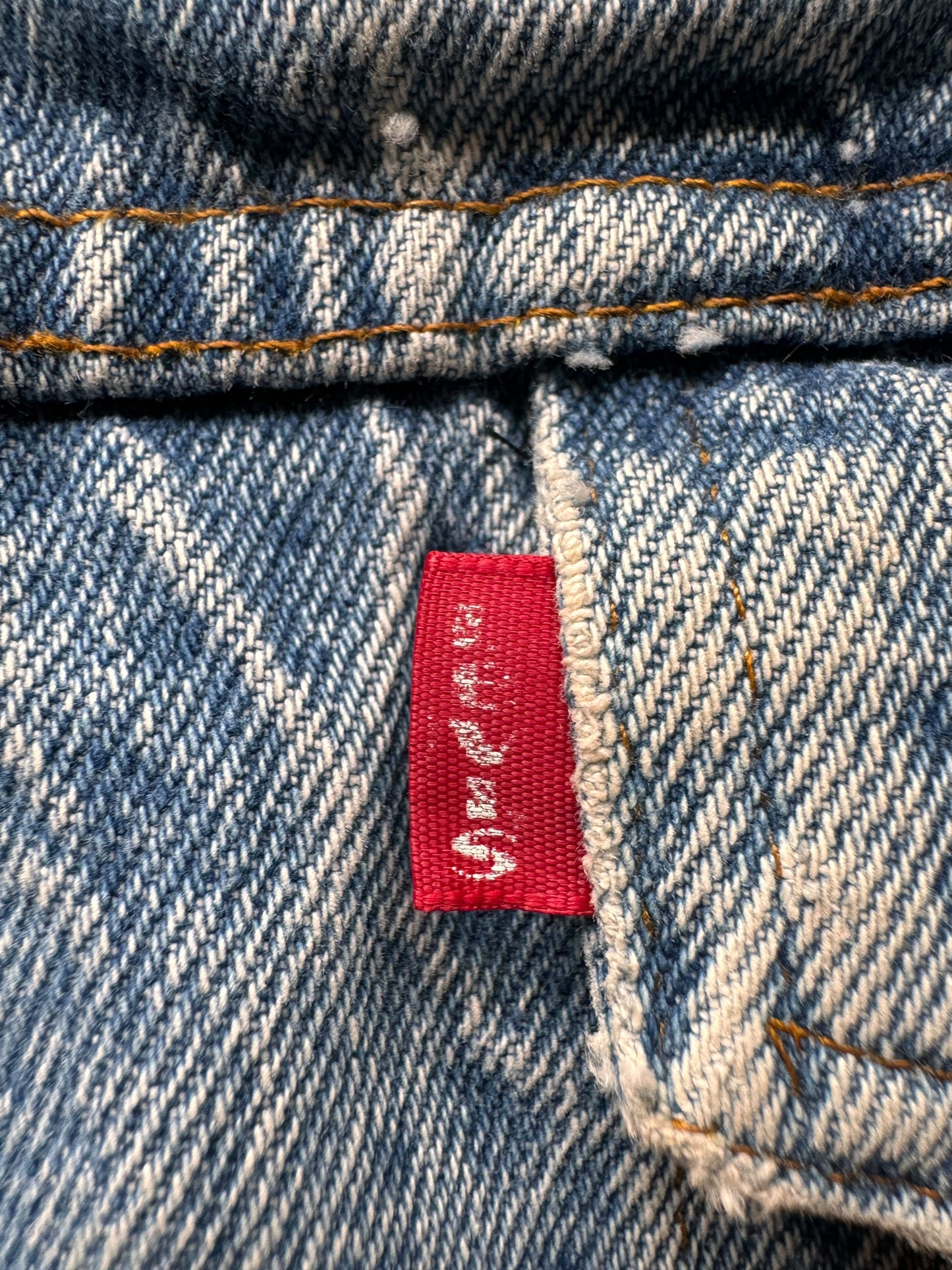 Small E on Vintage Lightwash Levis Sherpa Jacket SZ 46