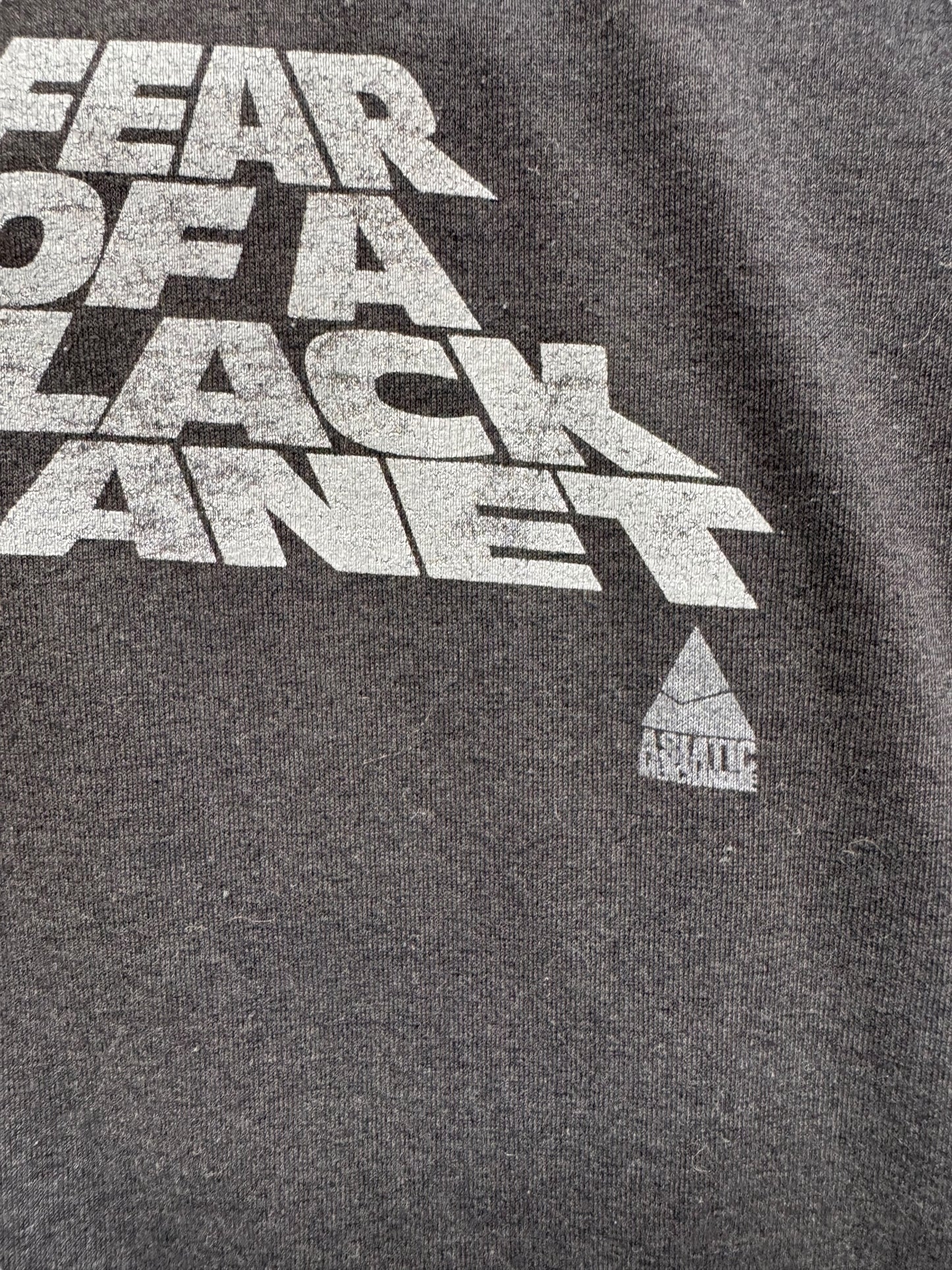 front graphic close up of Vintage Public Enemy Fear of a Black Planet Rap Tee SZ M