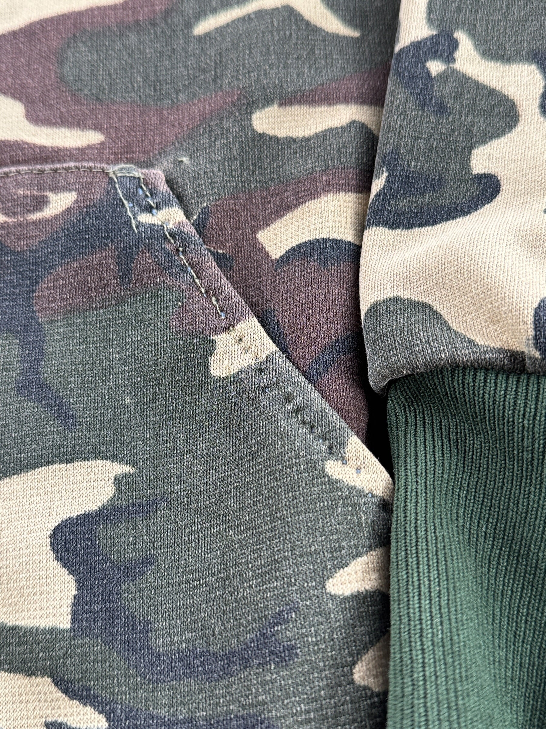 Stitch separation on pocket of Vintage Thermal Lined Woodland Camo Zip Up Hoodie SZ M