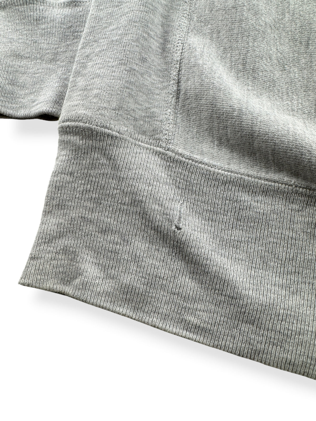 Ware on back of bottom hem on Vintage 90s Champion U of V Reverse Weave Crewneck SZ XL (Fits L)