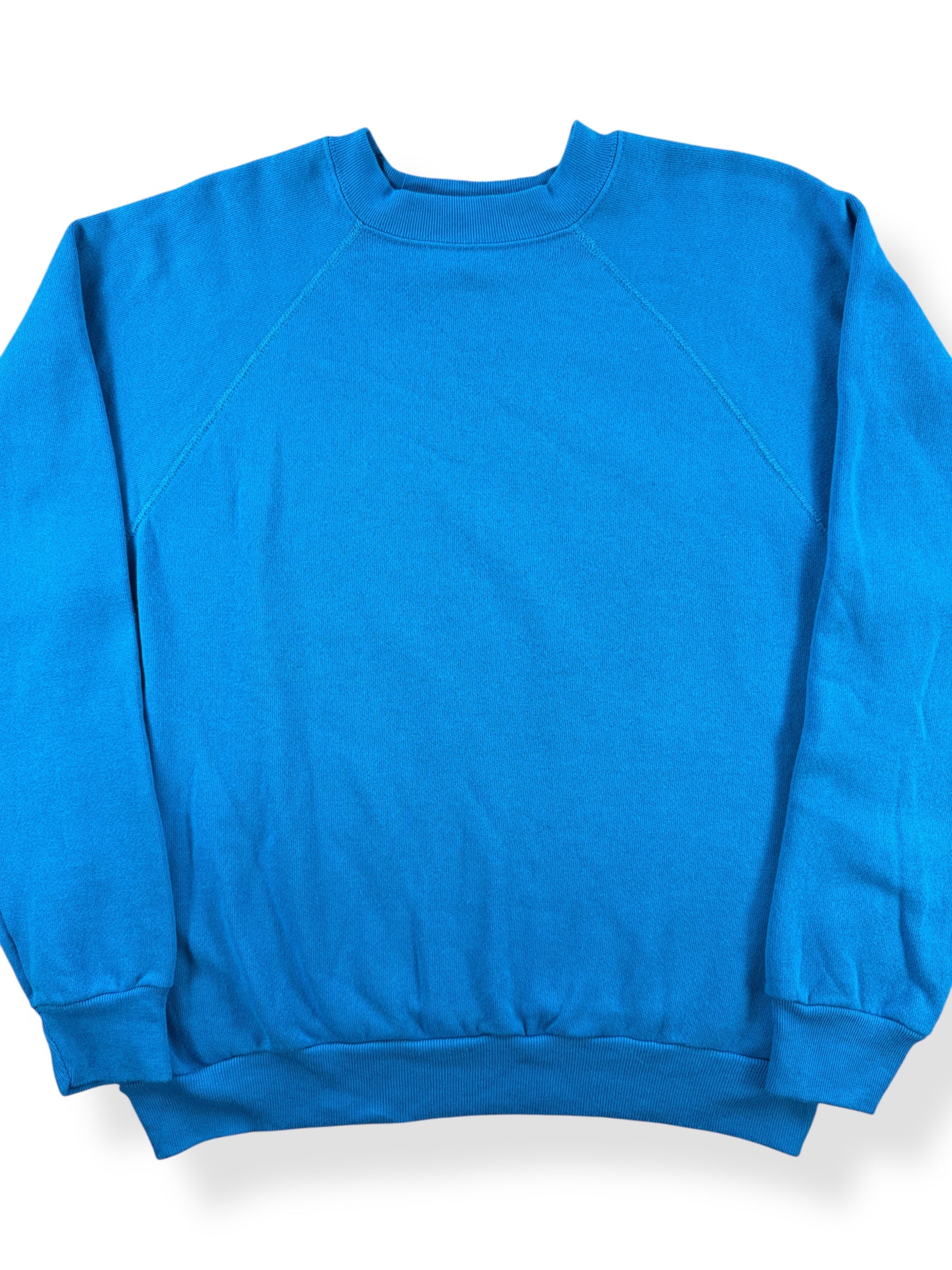 Front Close Up of Vintage Tultex Blue Blank Crewneck SZ L