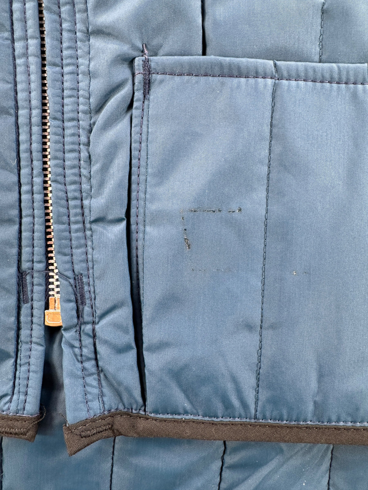 Stain on pocket of Vintage Quilted Navy Blue Vest SZ M