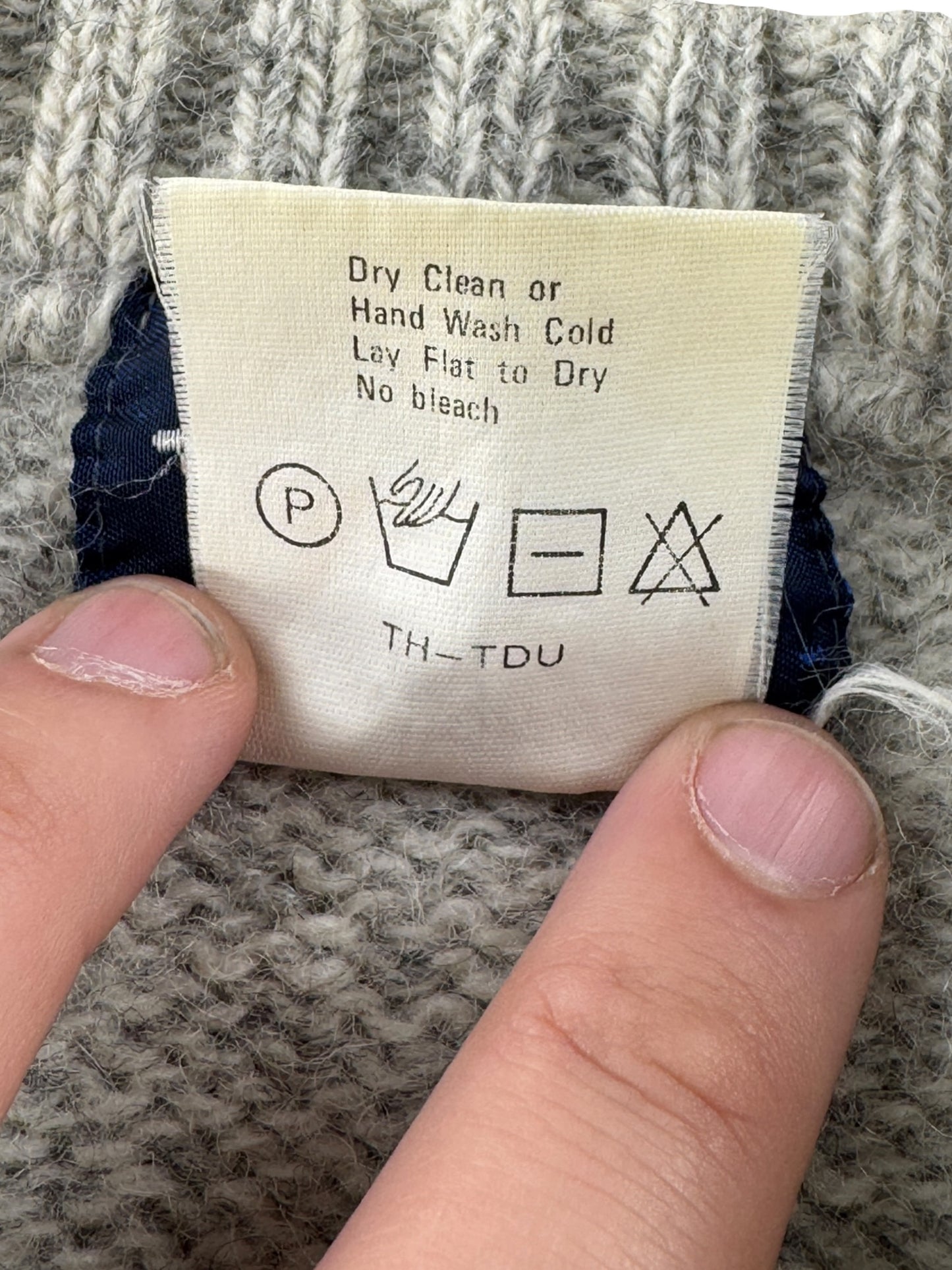 Other side of tag on Vintage Woolrich Grey Wool Blend Sweater SZ M