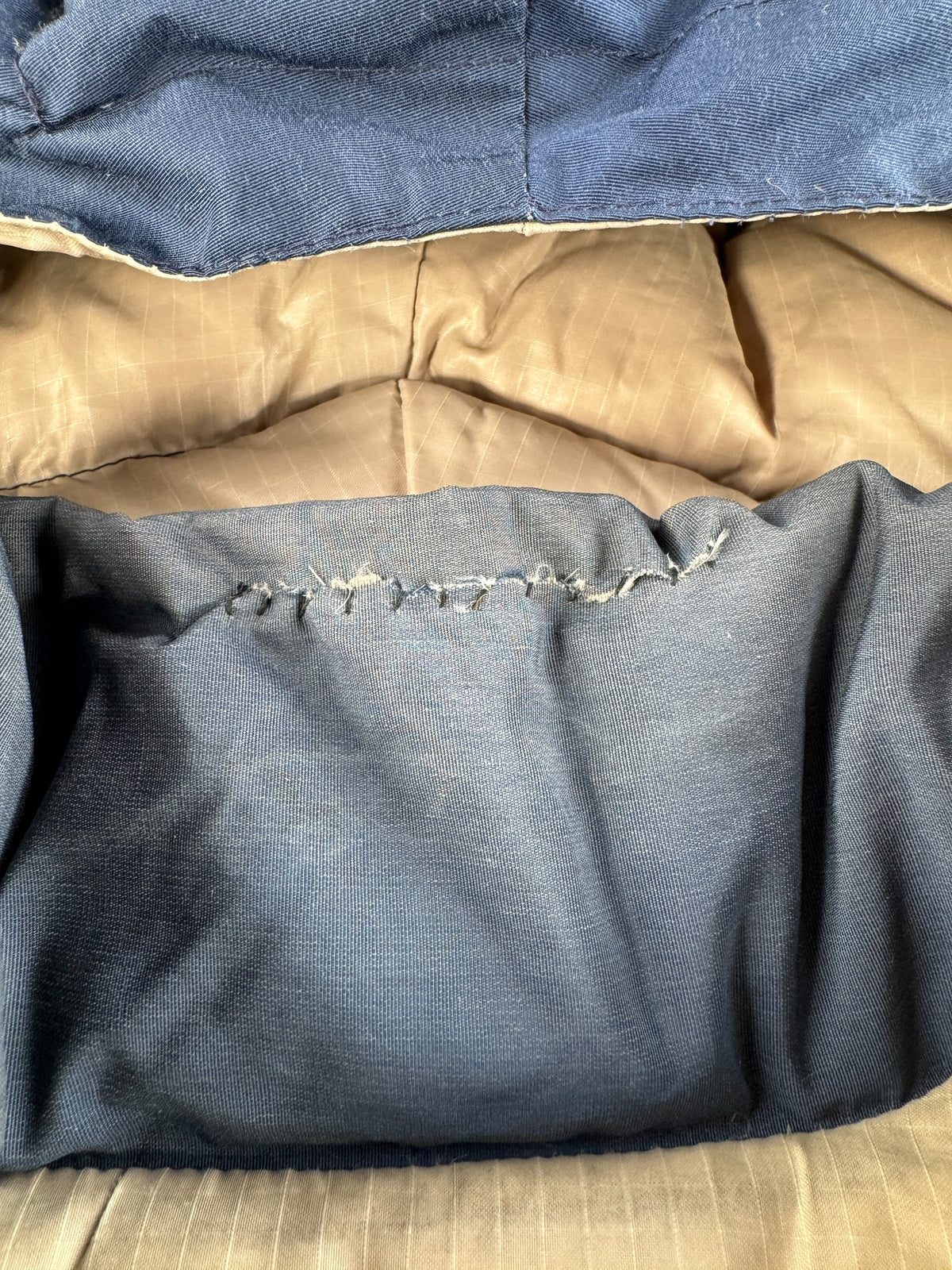 Repair on collar of Vintage 80’s REI Down Jacket SZ L
