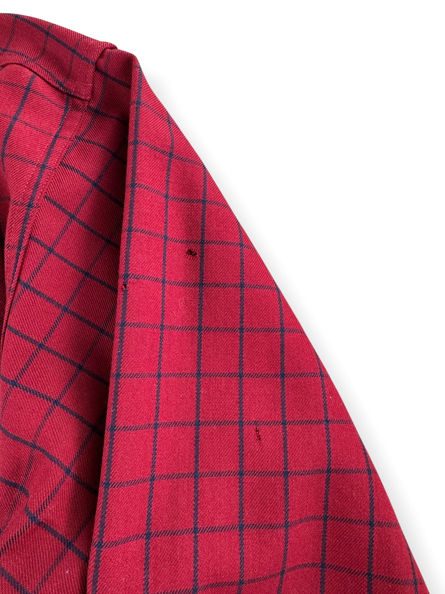 Sall holes on back right arm of Filson Red Guide Shirt SZ L