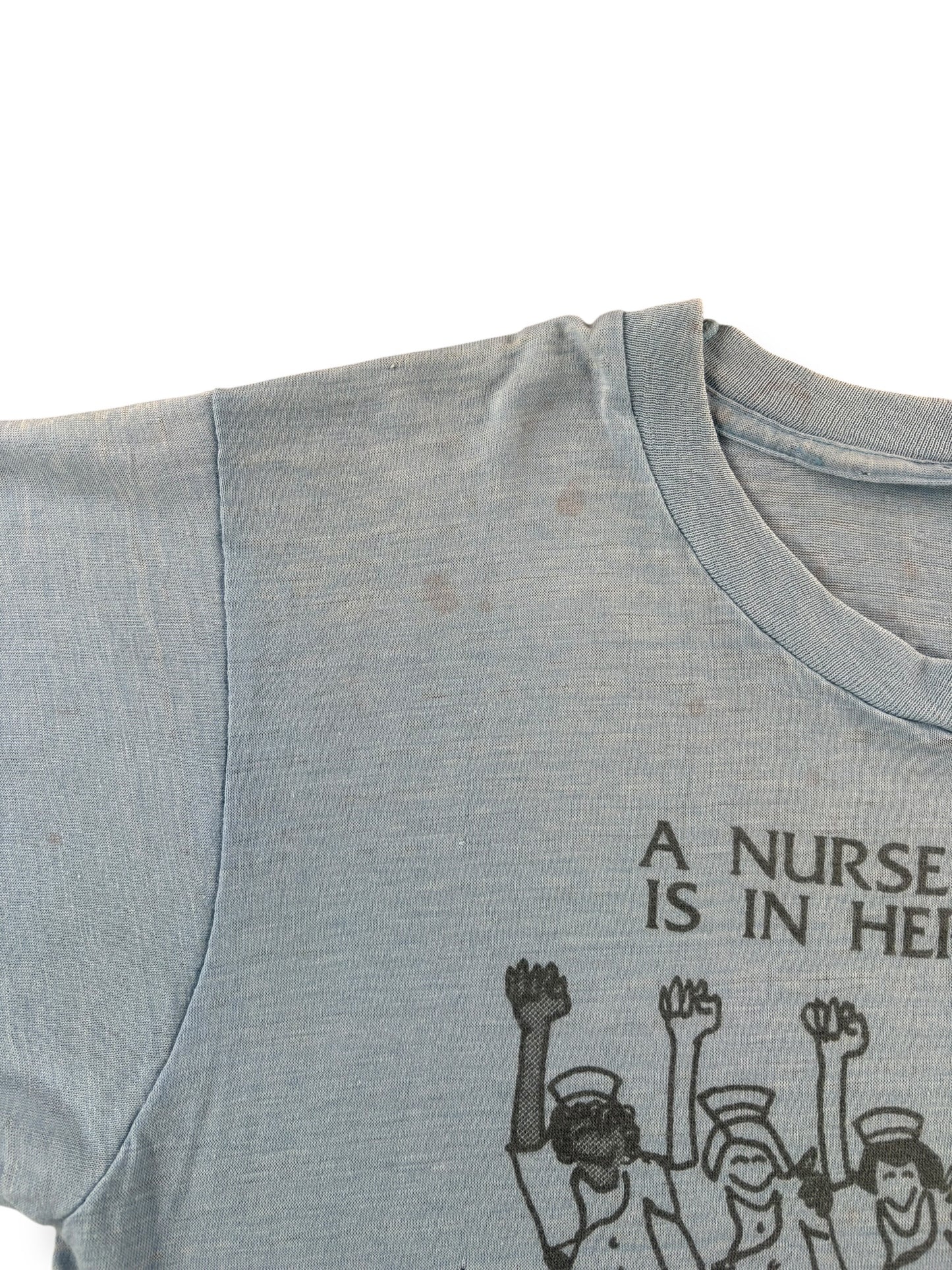 Stains on Vintage A Nurse's Place Is In Her Union Tee SZ M