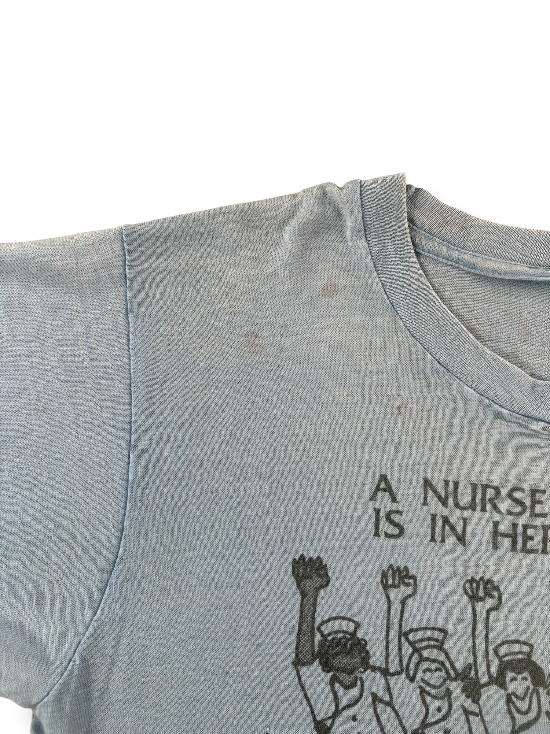 Stains on Vintage A Nurse's Place Is In Her Union Tee SZ M