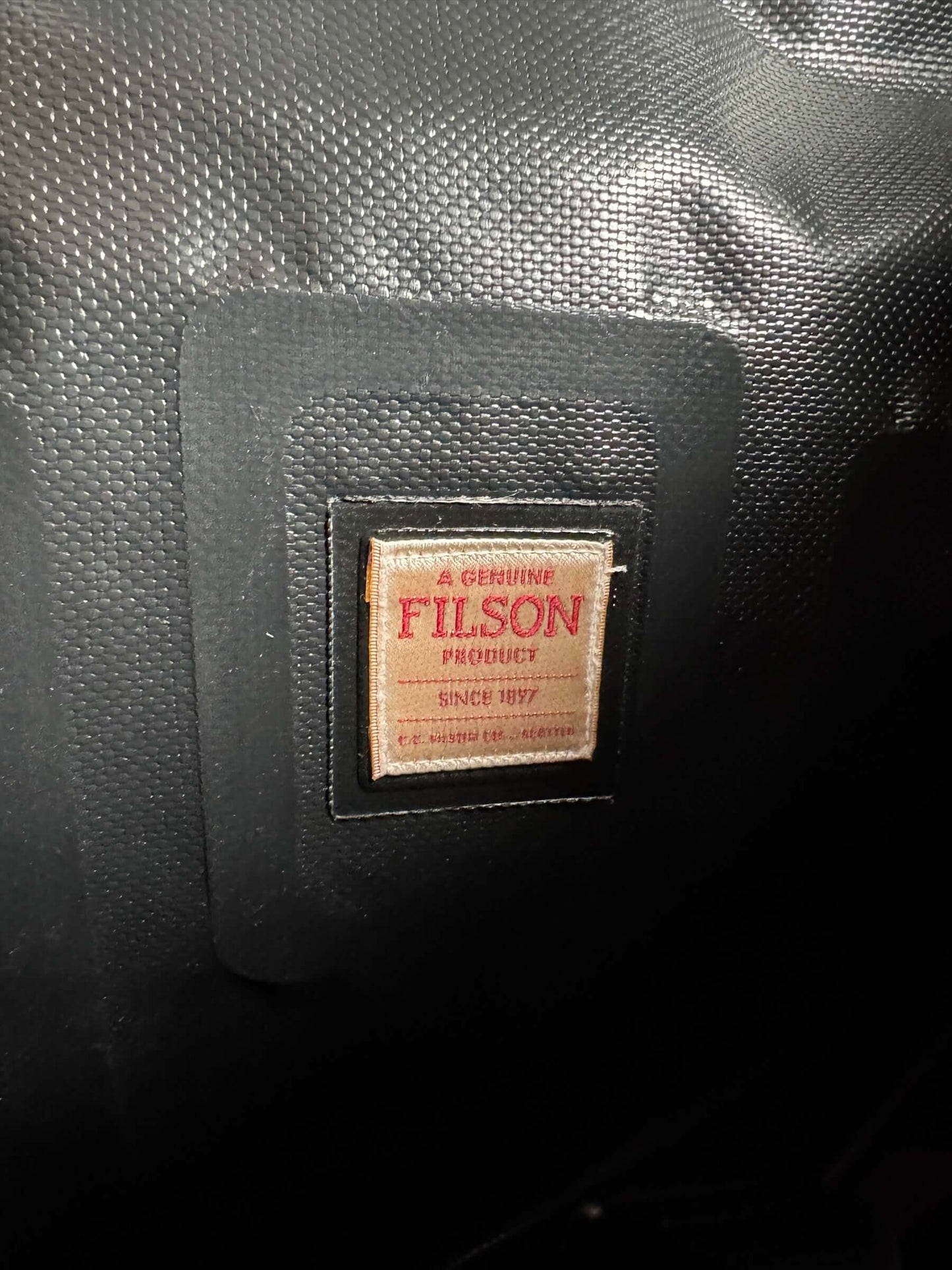 Filson logo on inside of Filson Dry Duffel Small Design Production Sample