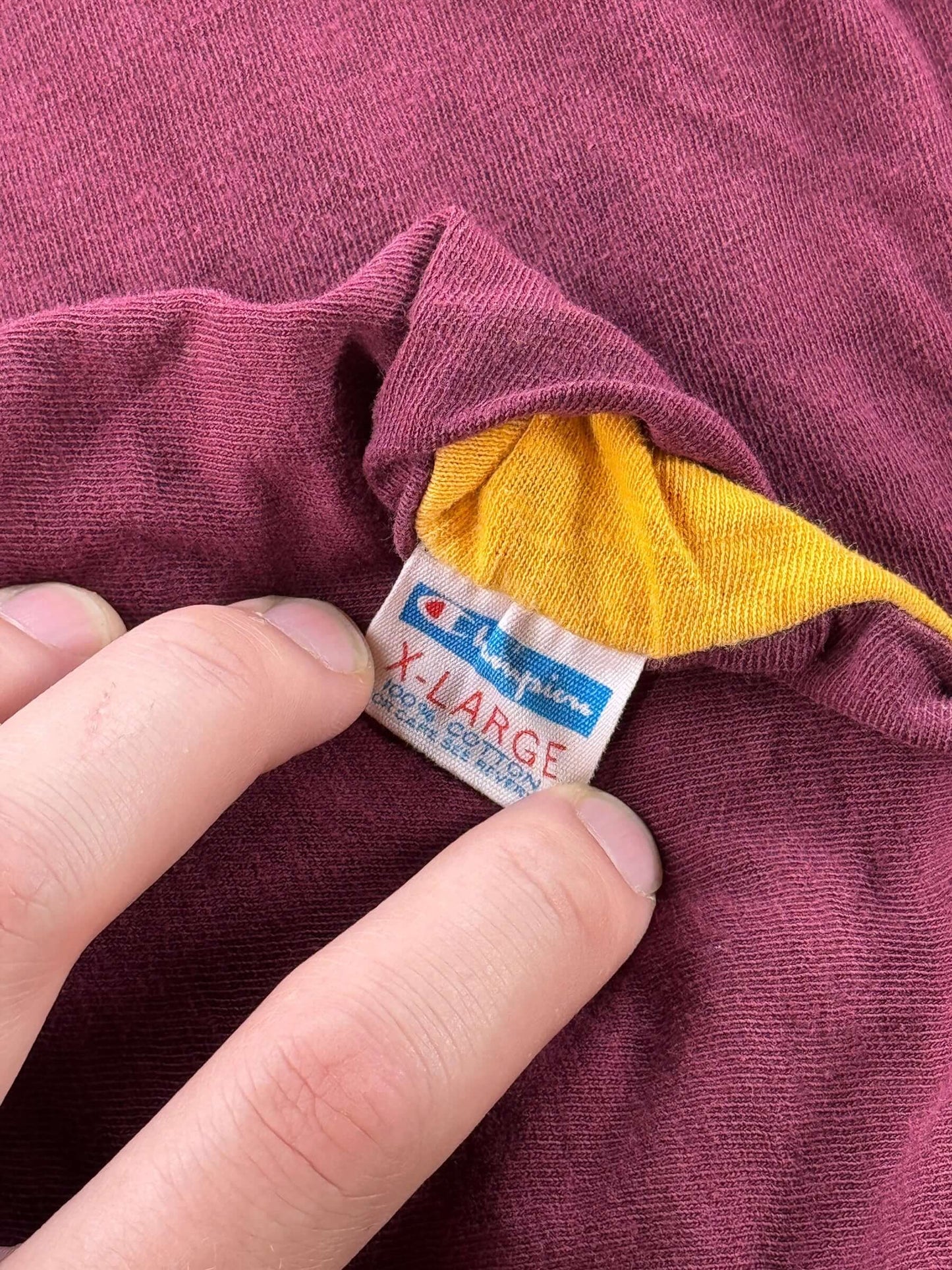 Size tag on Vintage Champion Blue Bar CMA Reversible Tee SZ L
