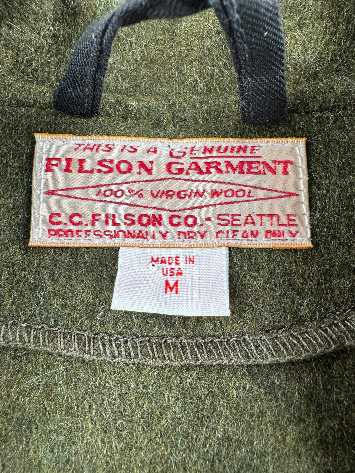 Tags on Filson Mackinaw Western Vest SZ M