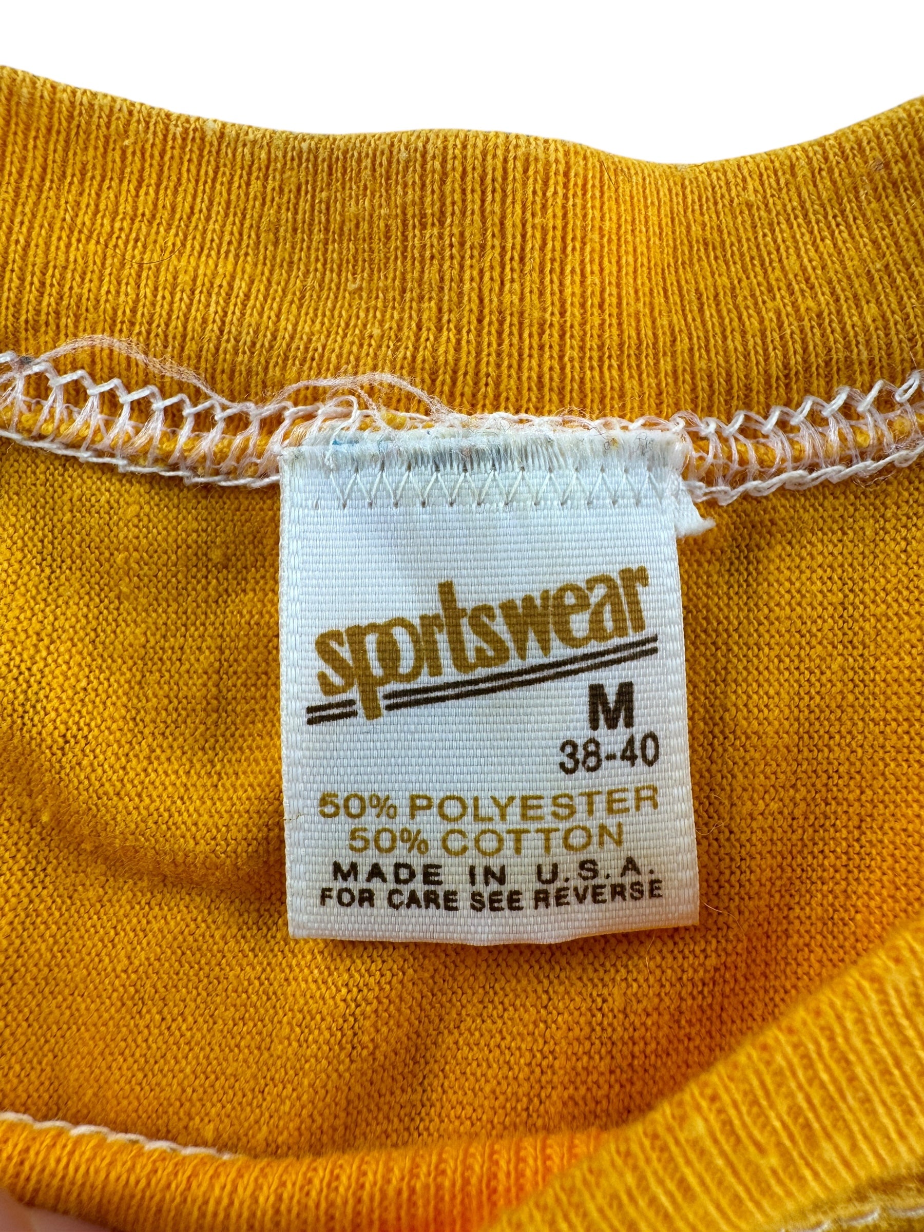 Tag on Vintage Juneau Packers Yellow Jersey SZ S
