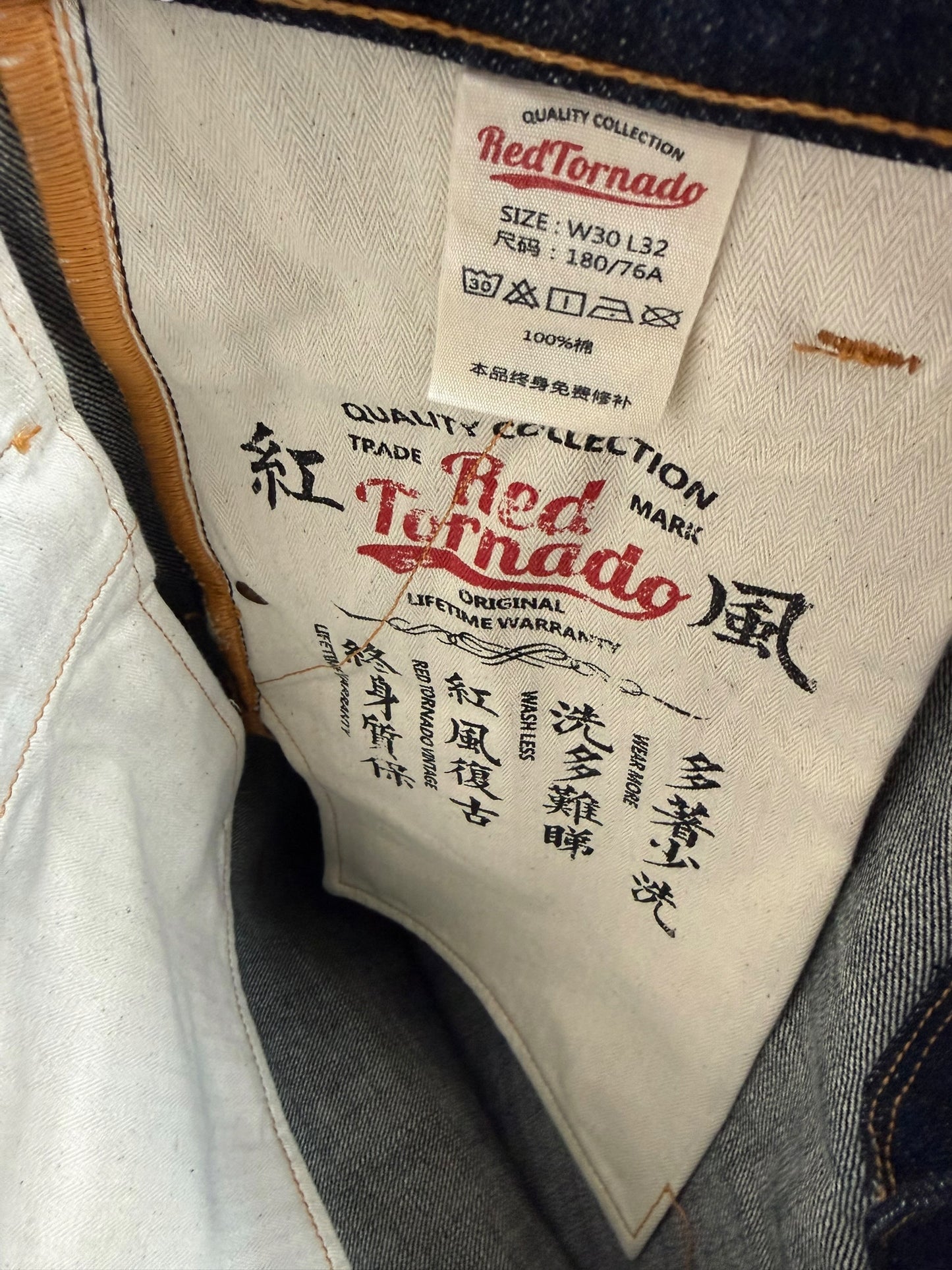 Stamped inner pocket branding and size tag on Red Tornado Japanese Selvedge Denim W33