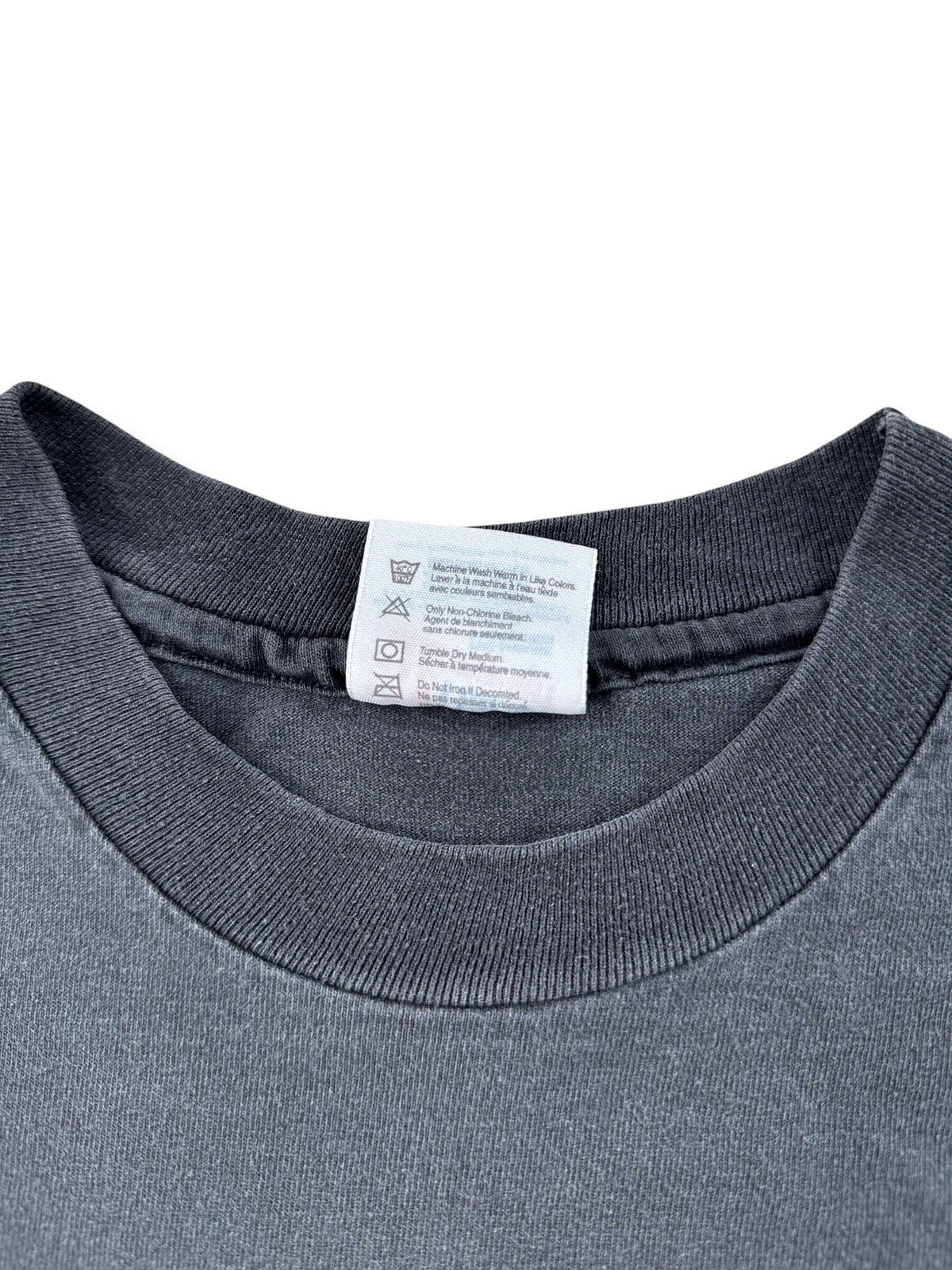 Back of tag on Vintage 1996 Olympics Faded Black Tee SZ M
