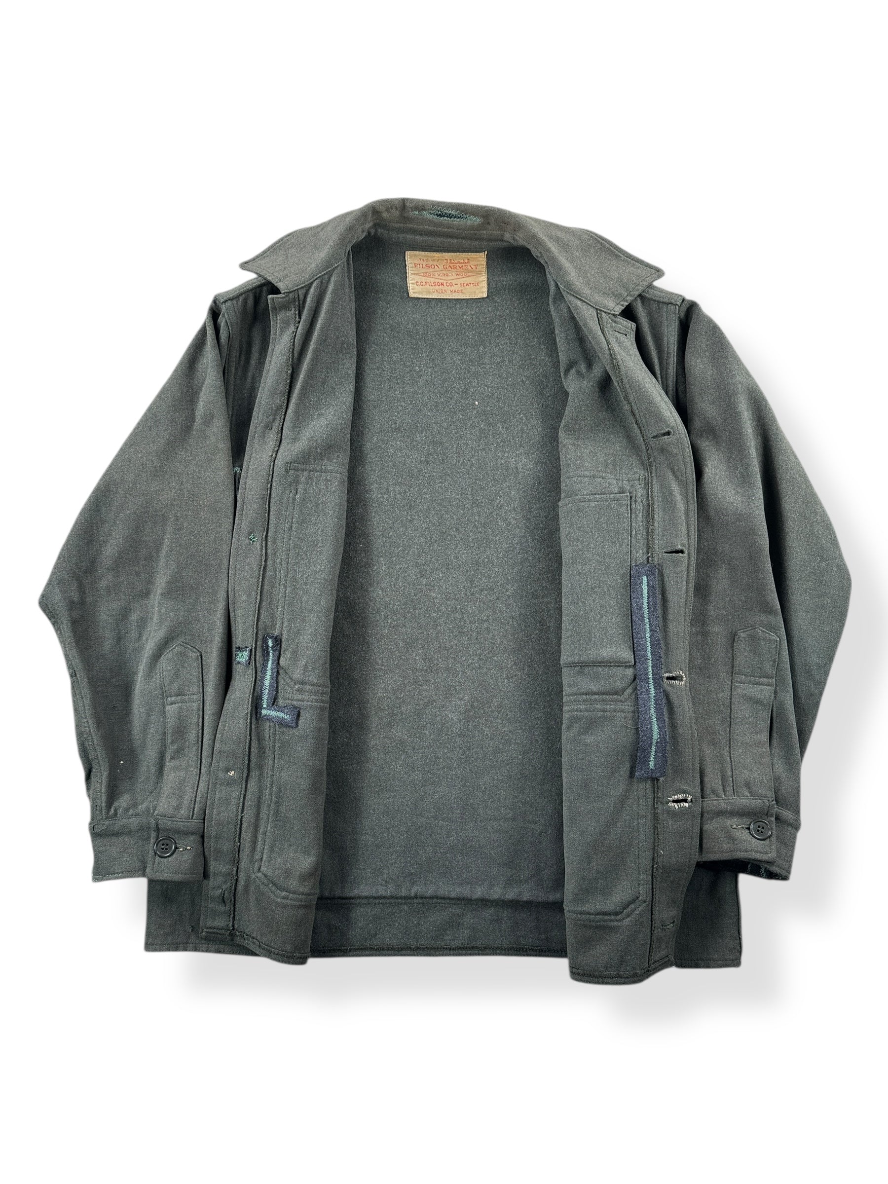 Inside of Vintage 60’s Filson Green Wool Mackinaw Jacket W/ Repairs SZ L