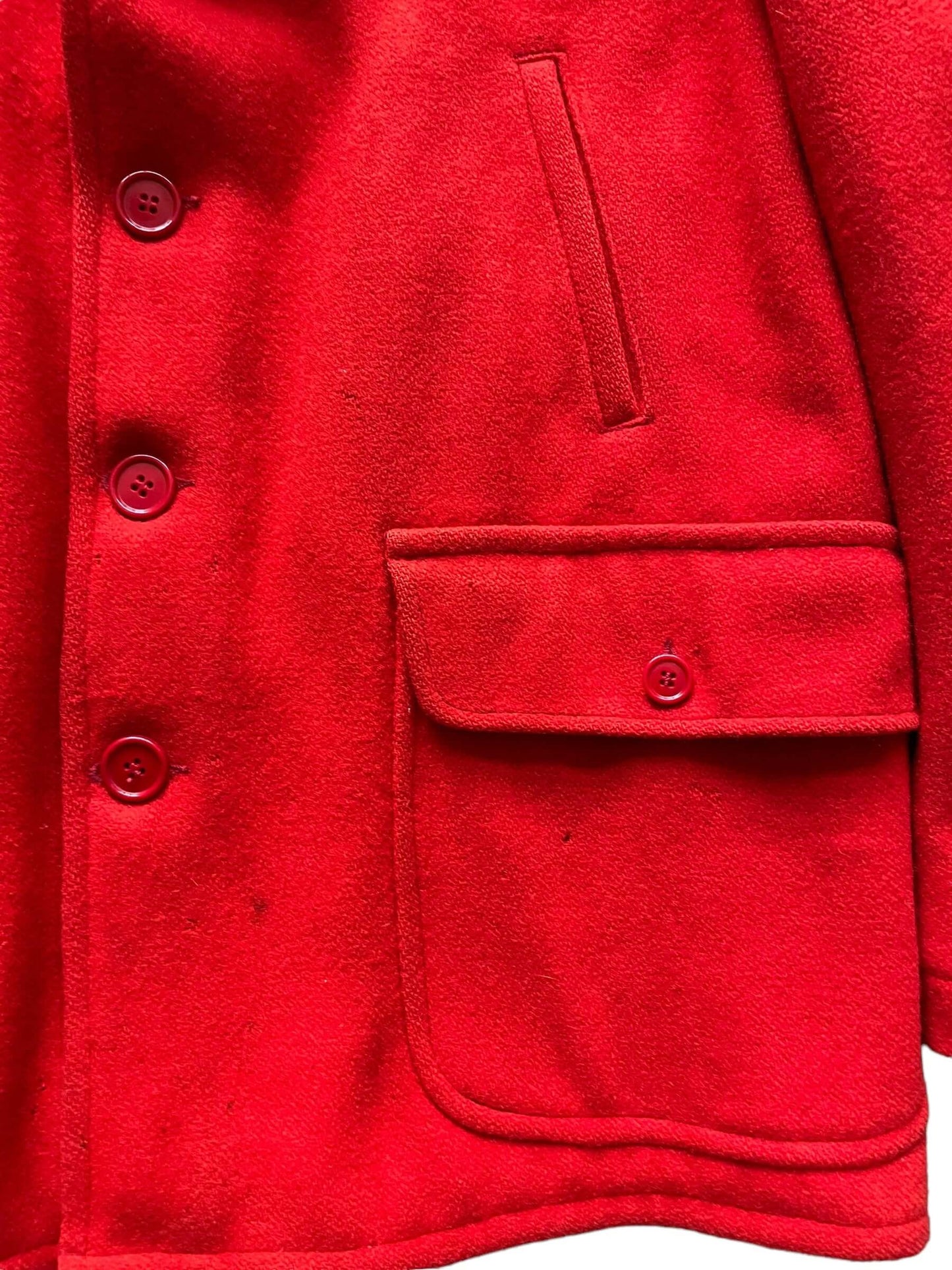 Lower left front pocket view of 1940s J.O. Ballard & CO Red Wool Hunting Jacket