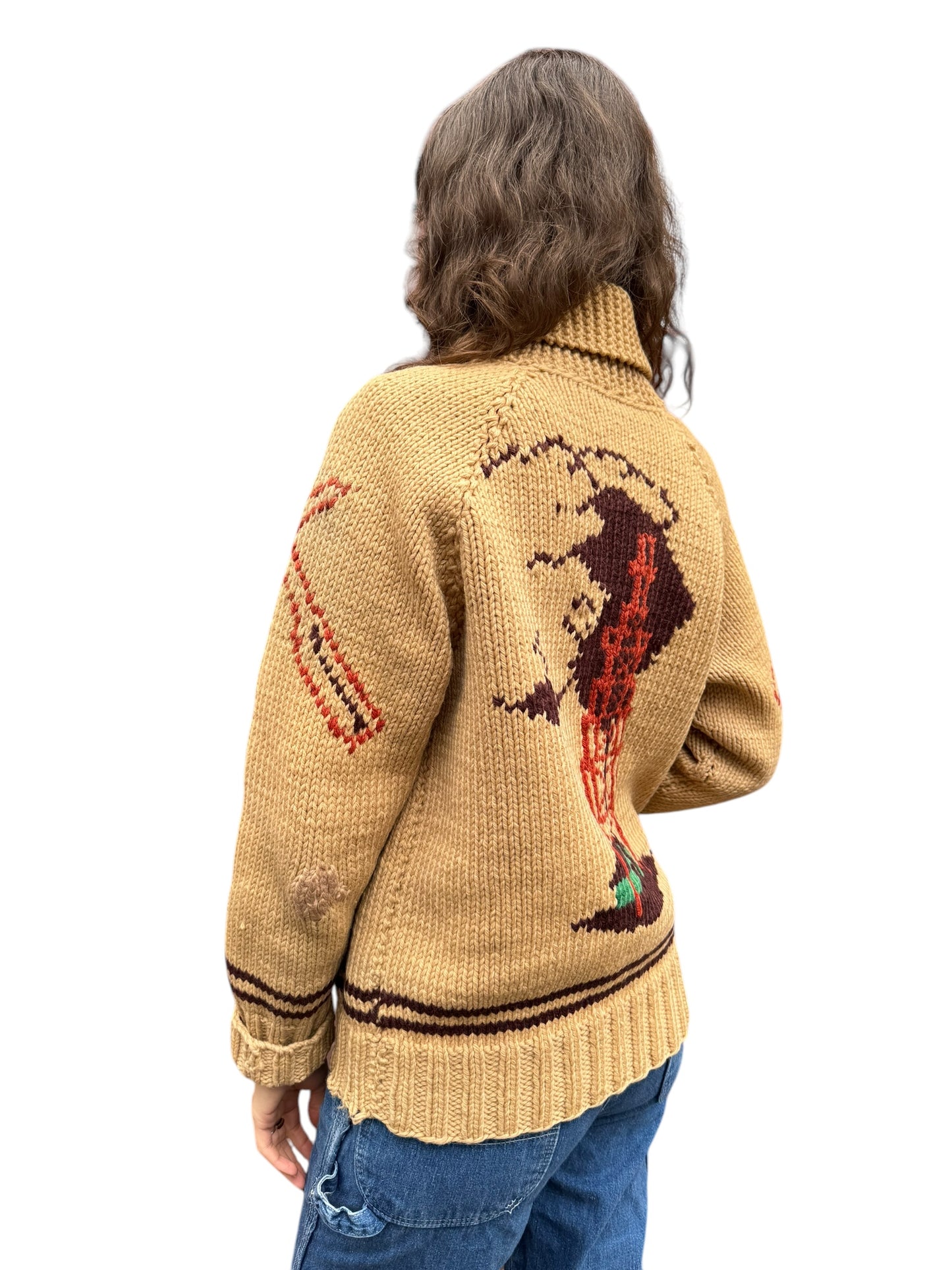 Side model view of Vintage Oil Derrick Themed Cowichan Style Sweater SZ M