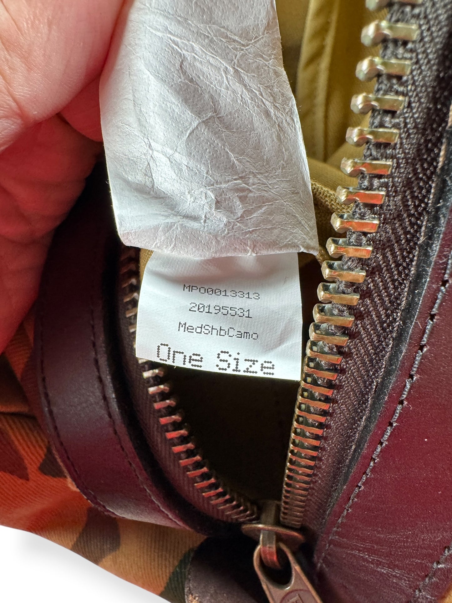 Production Tag View of Filson Limited Shrub Camo Travel Duffel