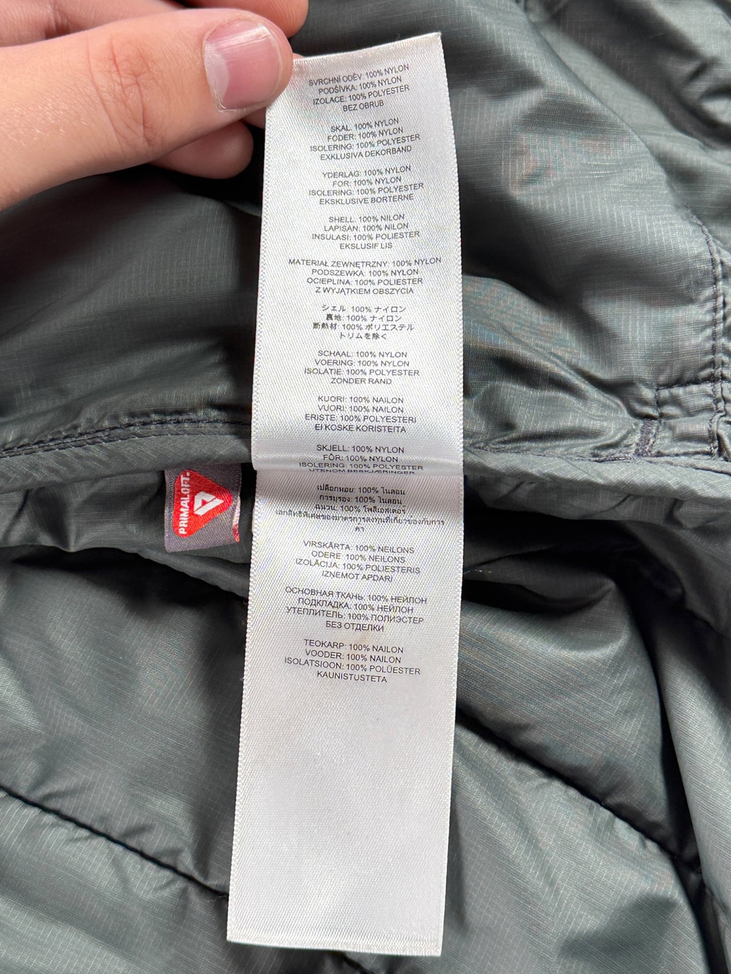 Inner tags on Filson Quilted Vest SZ M