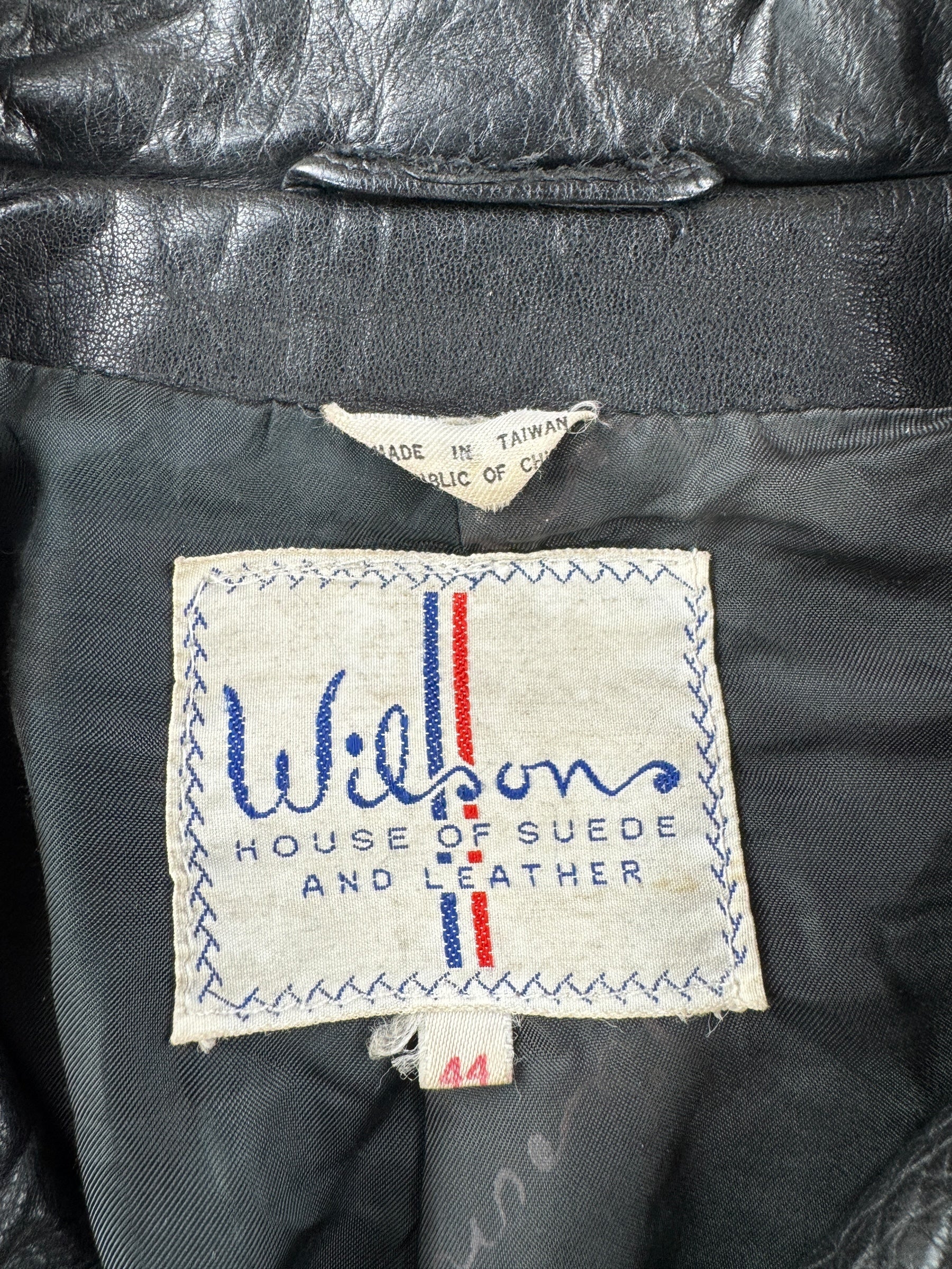 Tag of Vintage 70s Wilson's Cropped Leather Jacket SZ 44