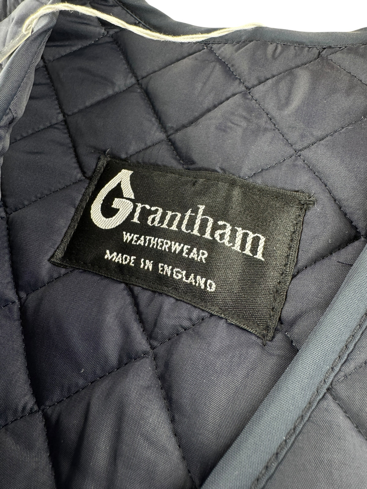 Label on Vintage Grantham Long Quilted Vest SZ S