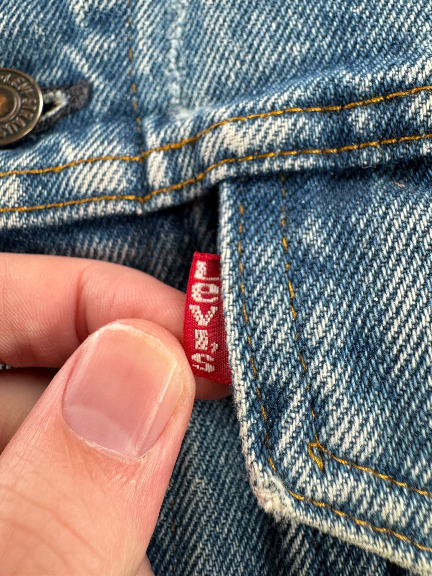 Label on Vintage Levi's 4 Pocket Denim Trucker Jacket SZ 42