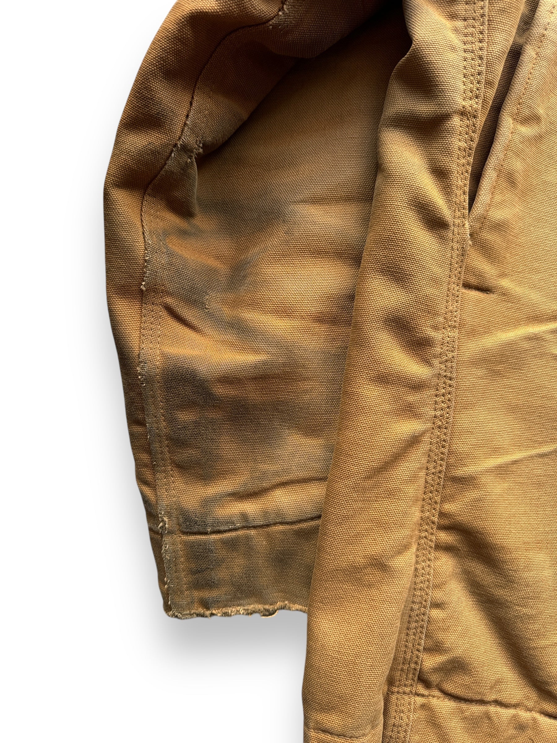 oil stains on left sleeve of Vintage 70's Carhartt Chore Jacket SZ 44