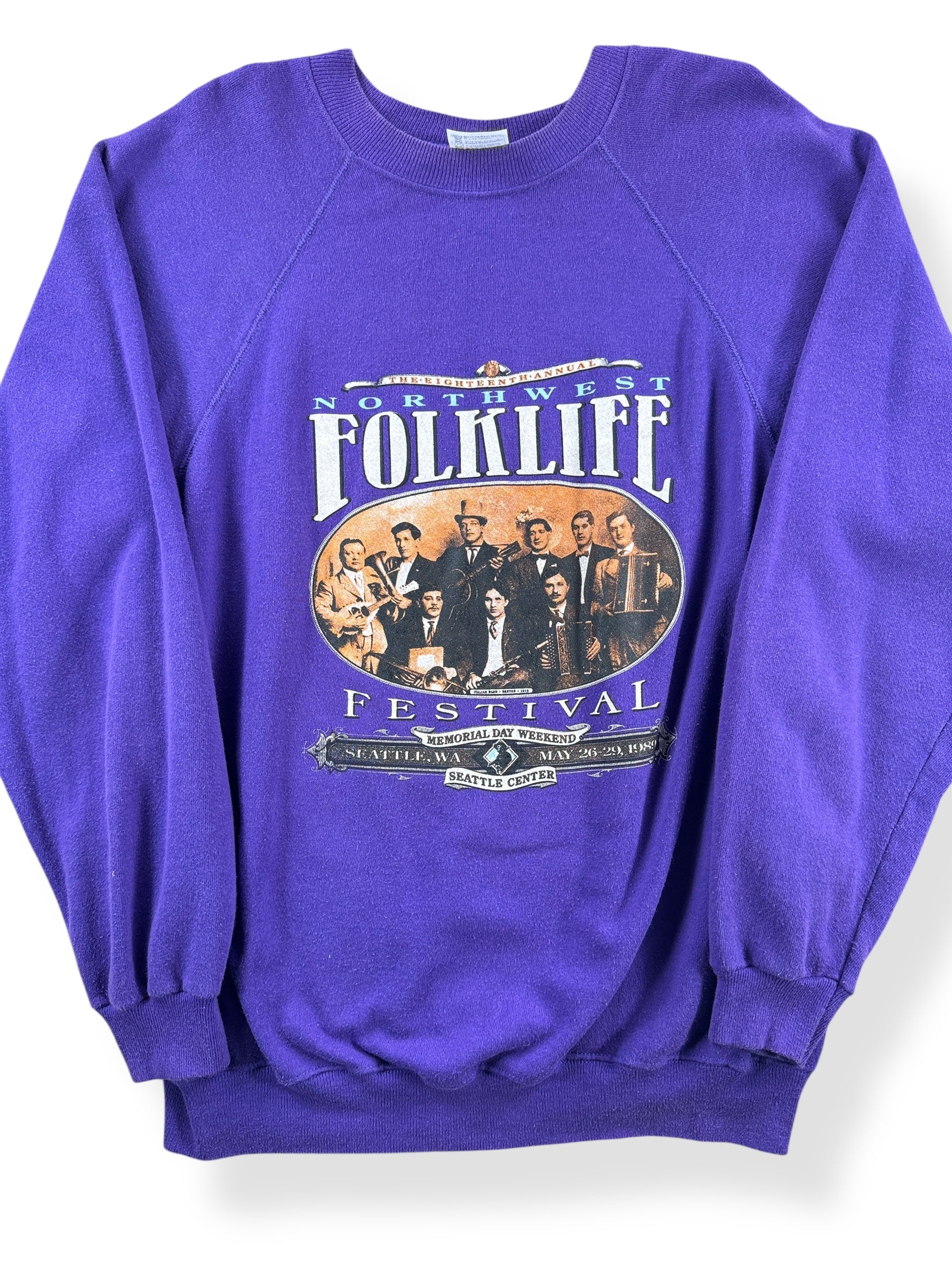 Front Close Up of Vintage 1989 Folklife Purple Crewneck SZ M
