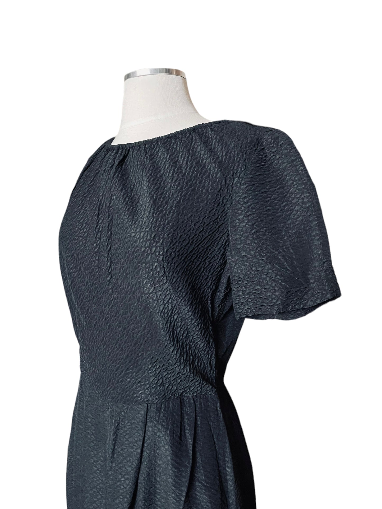 Front left side view of Vintage 1950s Black Textured Dress by Parkshire |  Barn Owl Vintage | Seattle Vintage Dresses