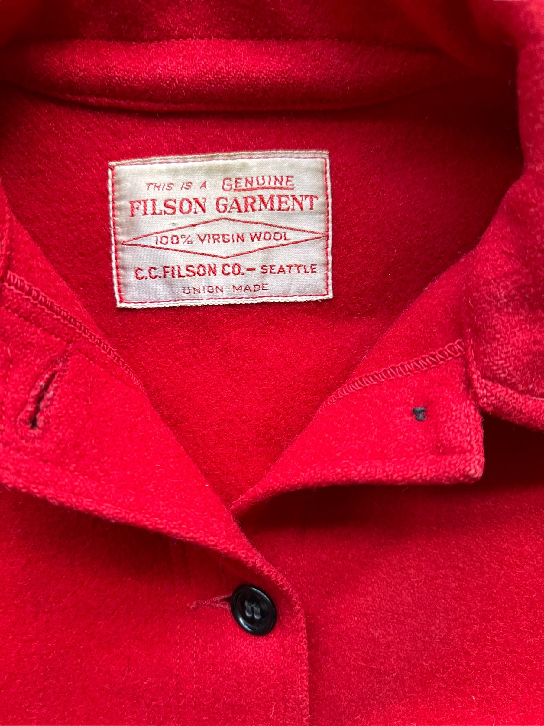 Tag View of Vintage Union Made Filson Scarlet Cruiser SZ 40 | Vintage Filson Seattle Workwear | Vintage Workwear Seattle