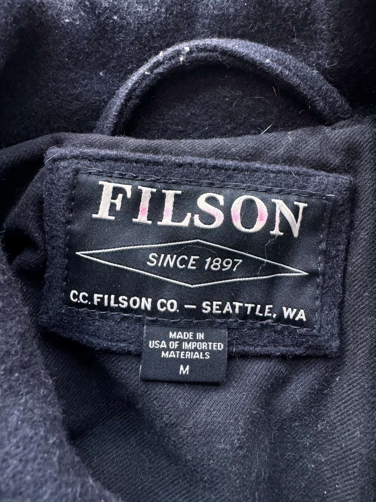 Label on Filson Navy Long Mackinaw Wool Cruiser SZ M