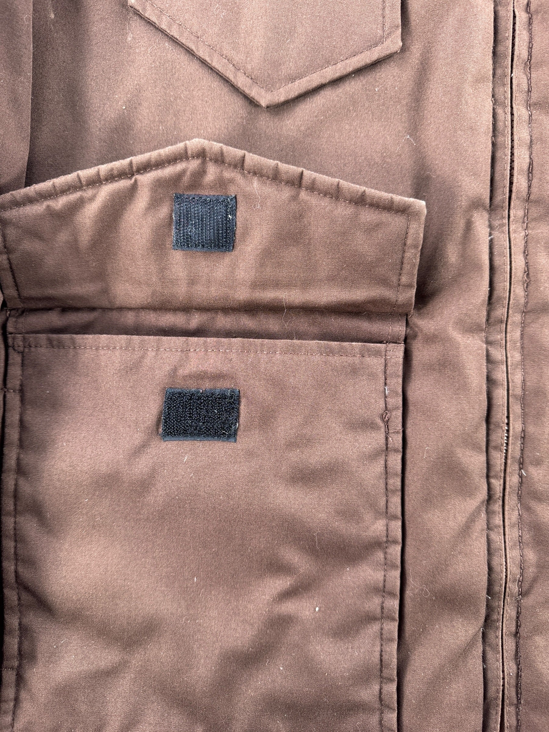 Velcro pocket closures on Vintage Reversible Brown Puffer Jacket SZ M