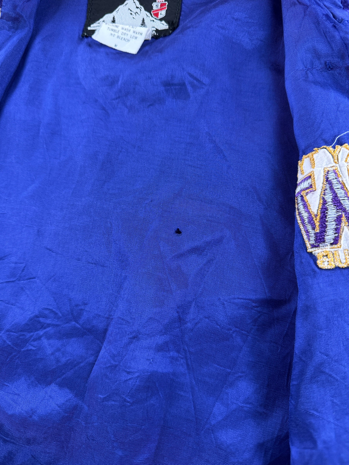 Small hole on inner lining of Vintage Skyline UW Club Jacket SZ M
