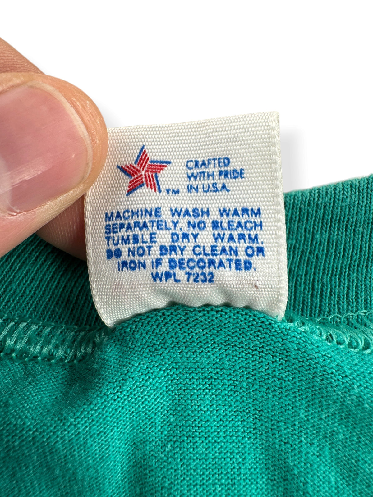 Back of tag on Vintage Olympia Mini Cooper Meet Tee SZ M