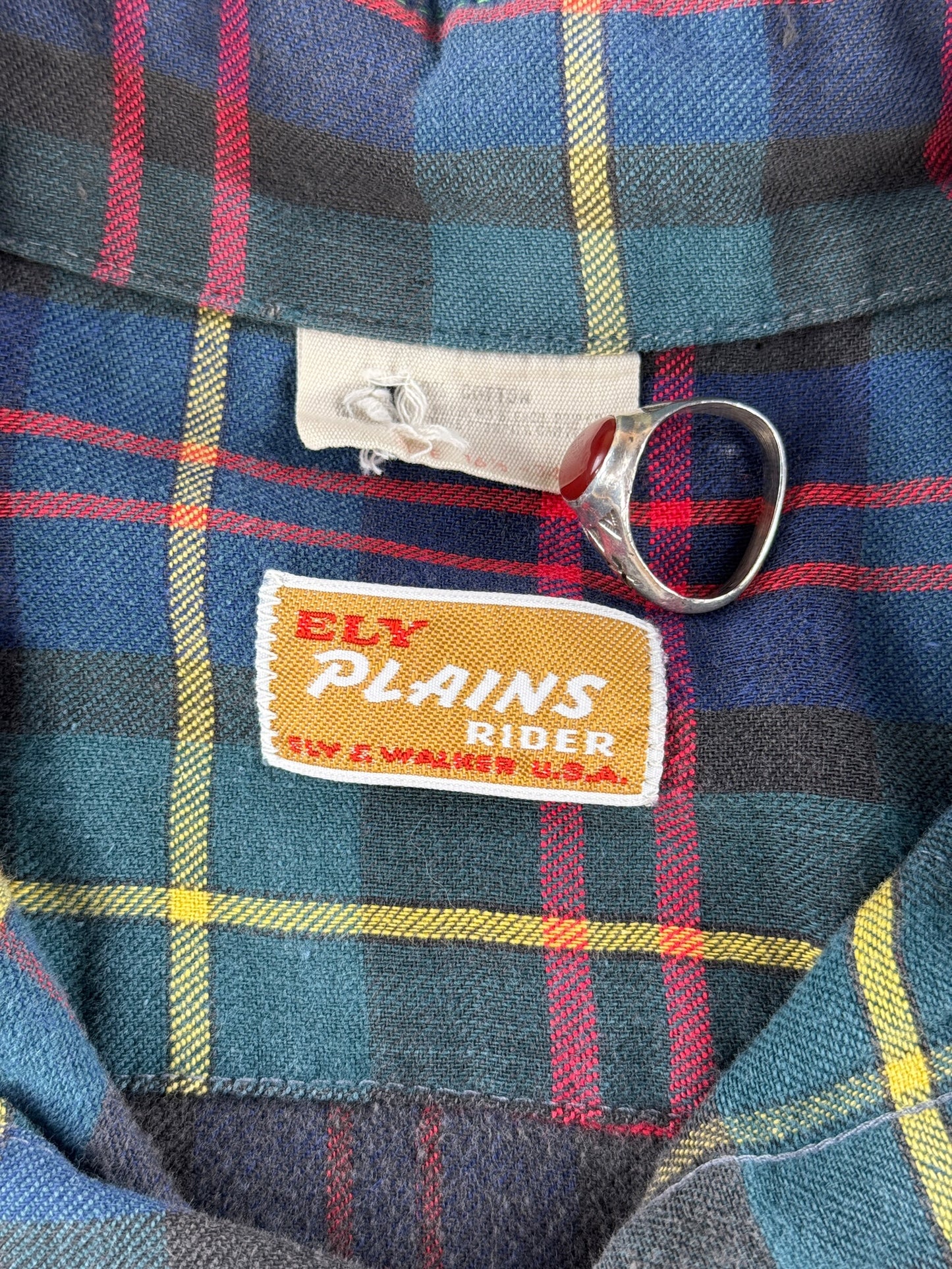 Tags on Vintage Ely Plains Rider Flannel Pearlsnap SZ 16 1/2