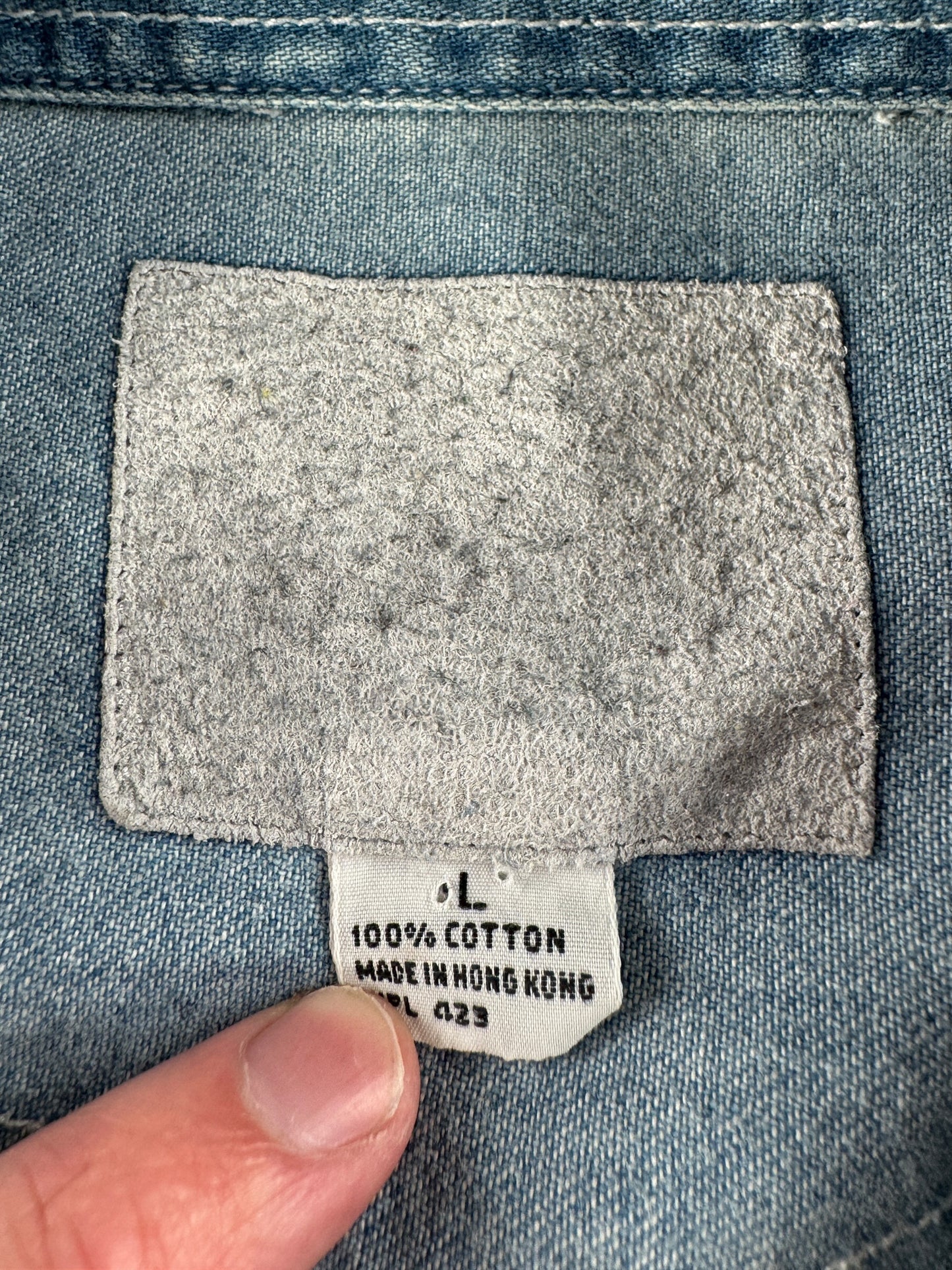 Close up tag of Vintage Levi's Silvertab Denim Button Up Shirt SZ L