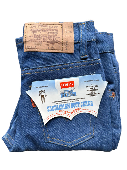 Folded view of Vintage Deadstock Saddleman Boot Cut Jeans 24x23 | Seattle Kid's Vintage | Barn Owl Deadstock Levi's