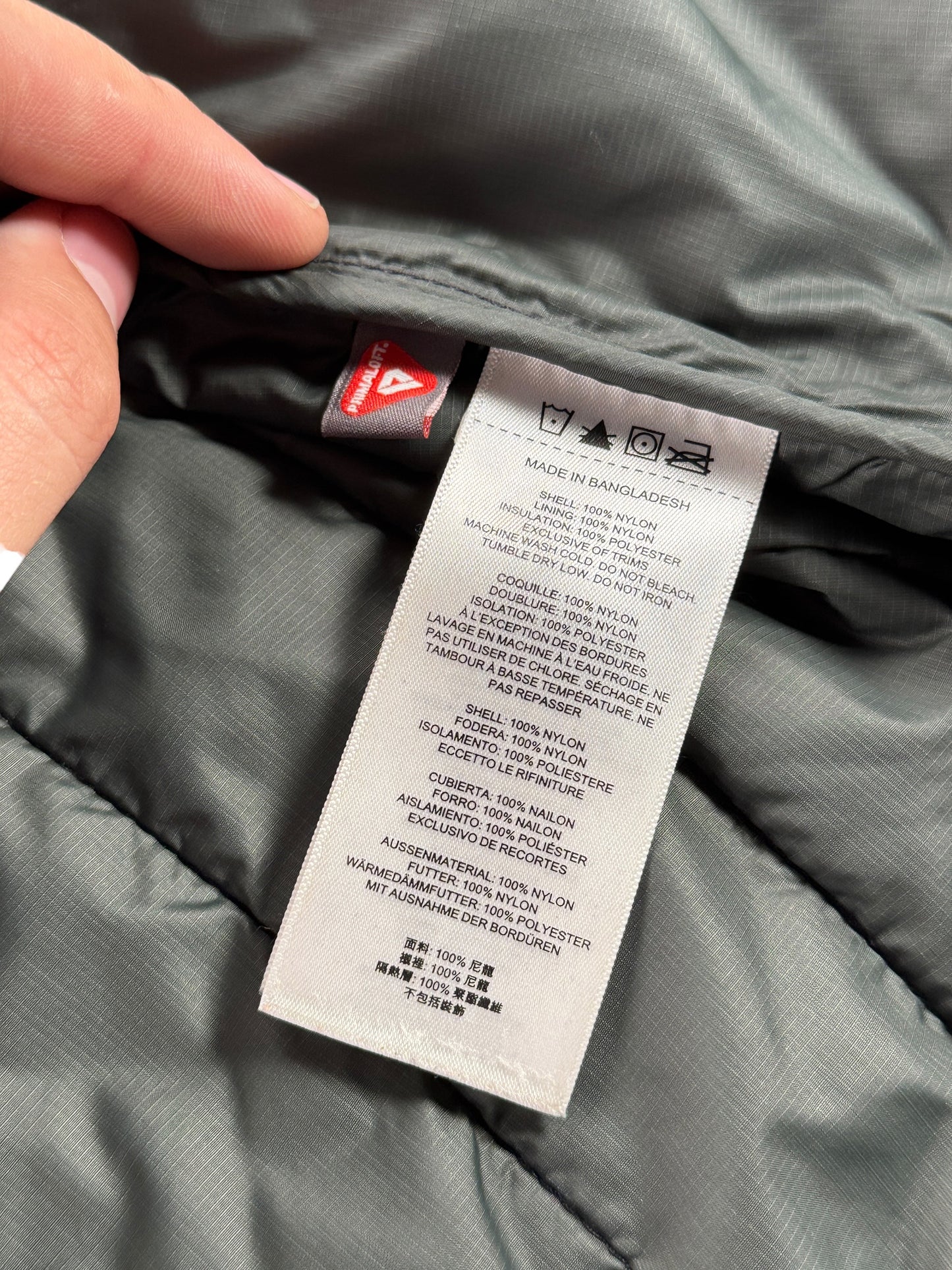 Inner tags on Filson Quilted Vest SZ M