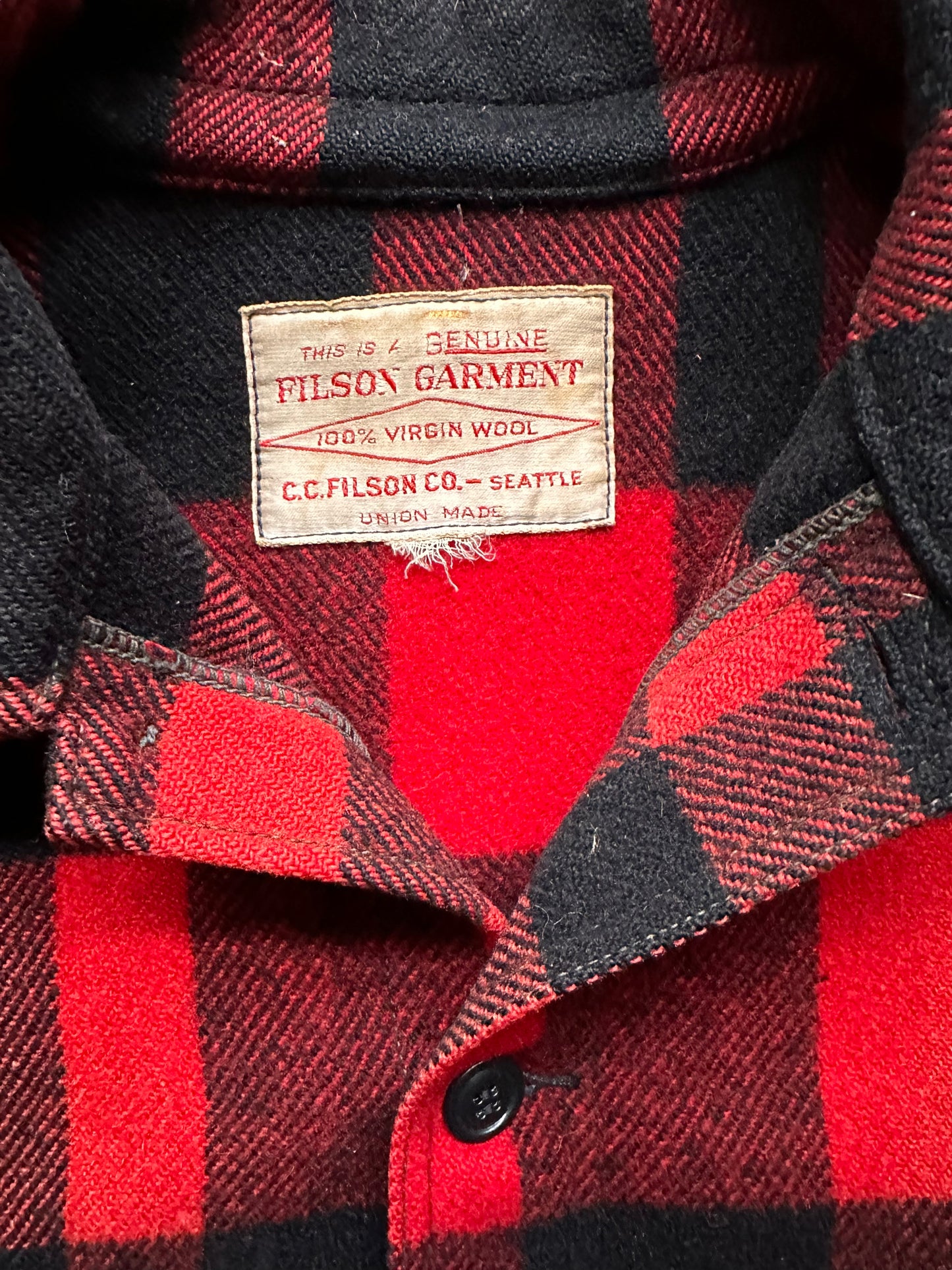 Tag View of Vintage Sun Faded Union Made Filson  Red and Black Mackinaw Cruiser SZ 44 |  Vintage Filson Mackinaw | Vintage Filson Workwear Seattle