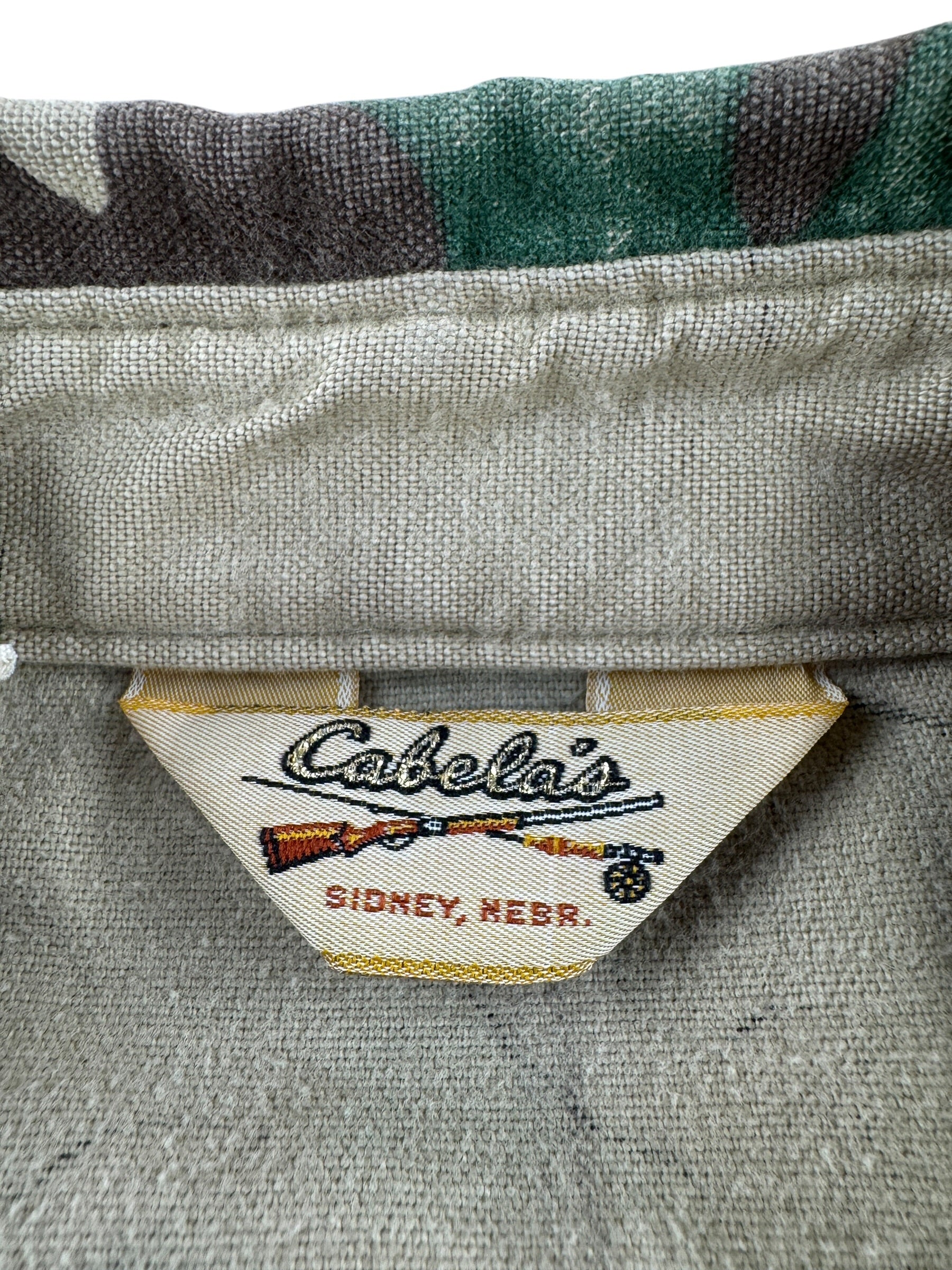 Label on Vintage 80s Cabela's Chamois Cloth Camo Button Up Shirt SZ XL