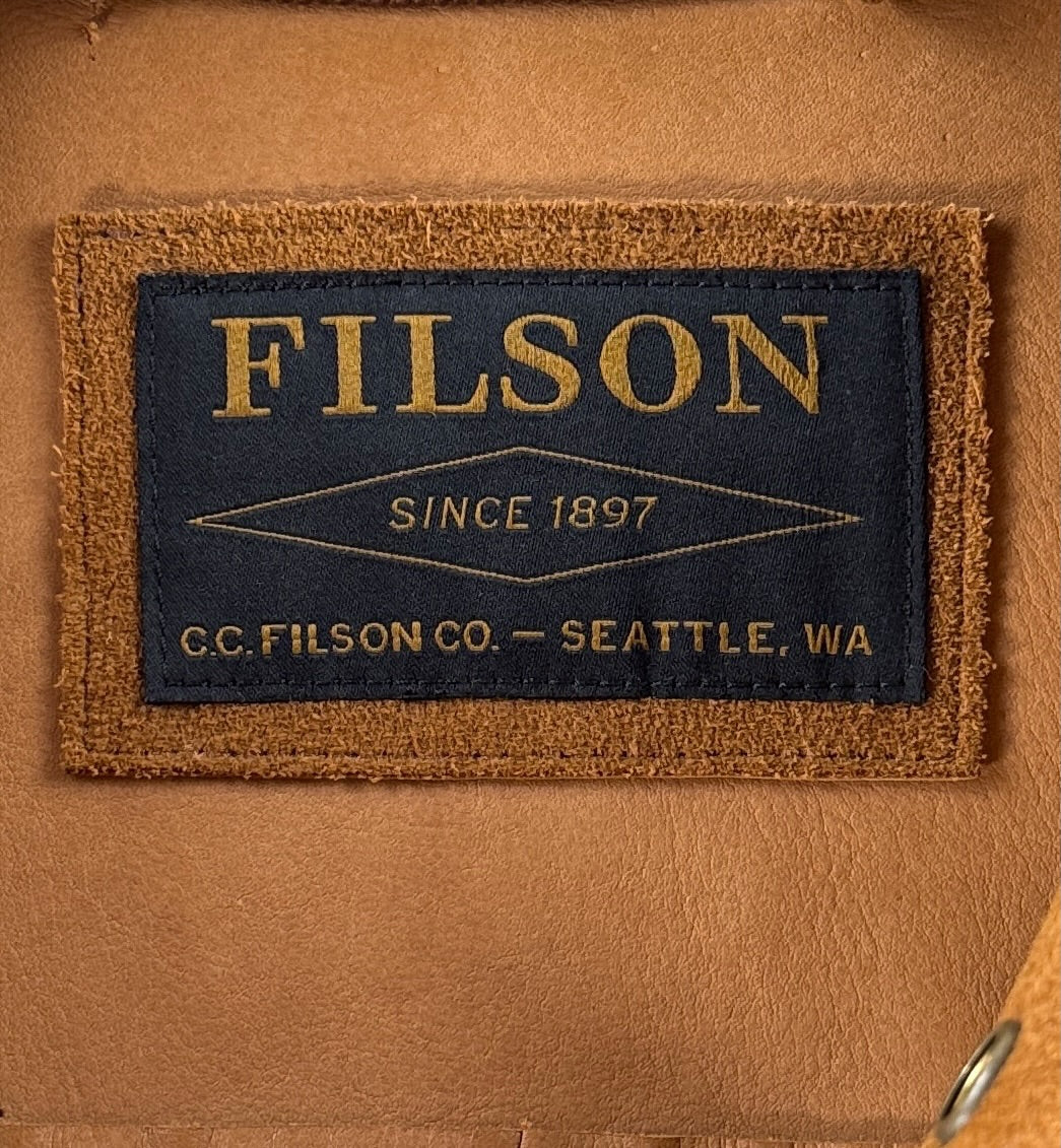 Brand Tag on inside of Filson Dark Tan Roughout Leather Short Cruiser SZ M