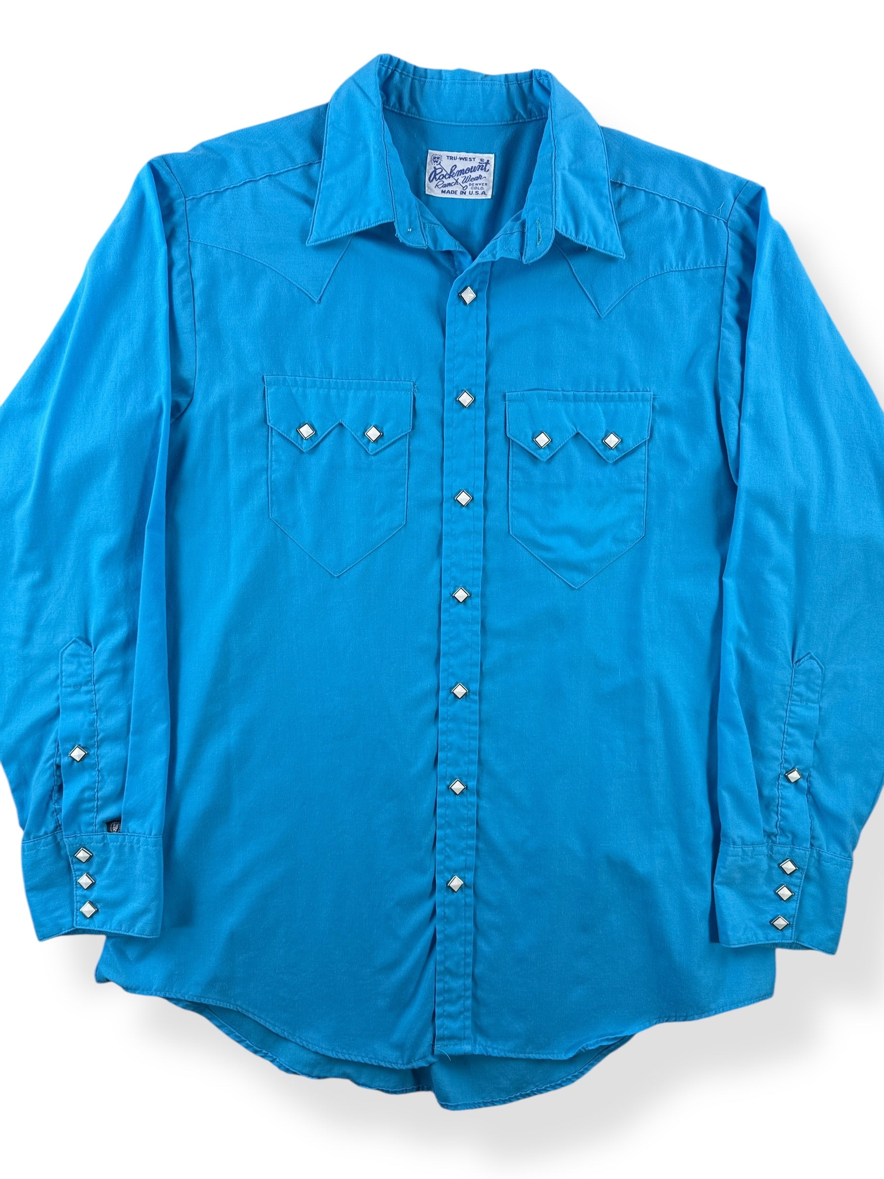 Front Close Up of Vintage Rockmount Electric Blue Pearl Snap SZ L