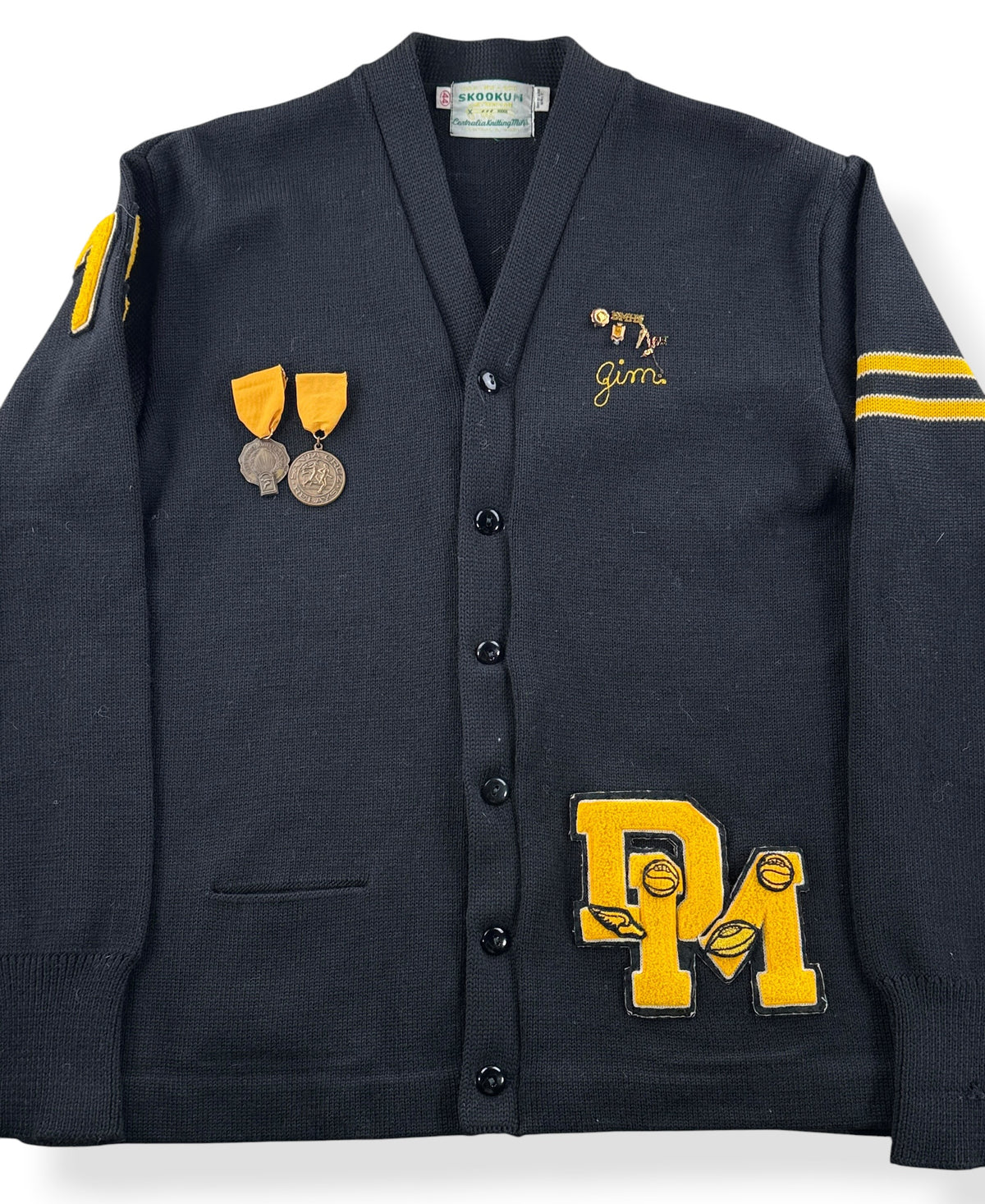 Close-up of Vintage Wool Lettermans Sweater with Medals + Pins SZ M