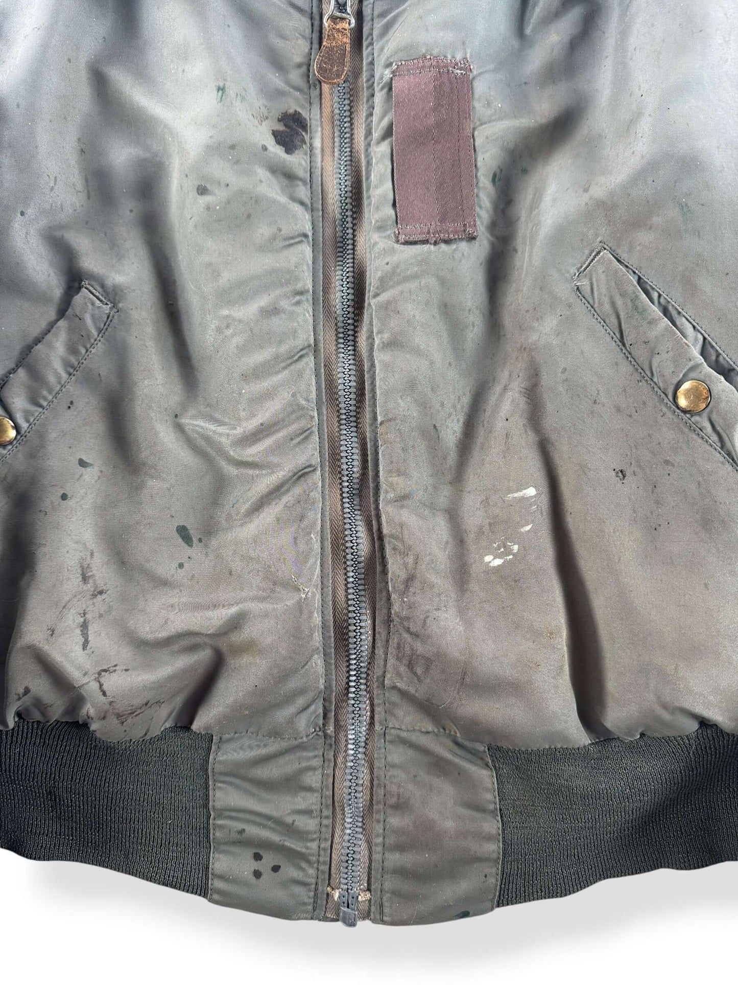 Stains on Vintage B-15 Thrashed Bomber SZ L