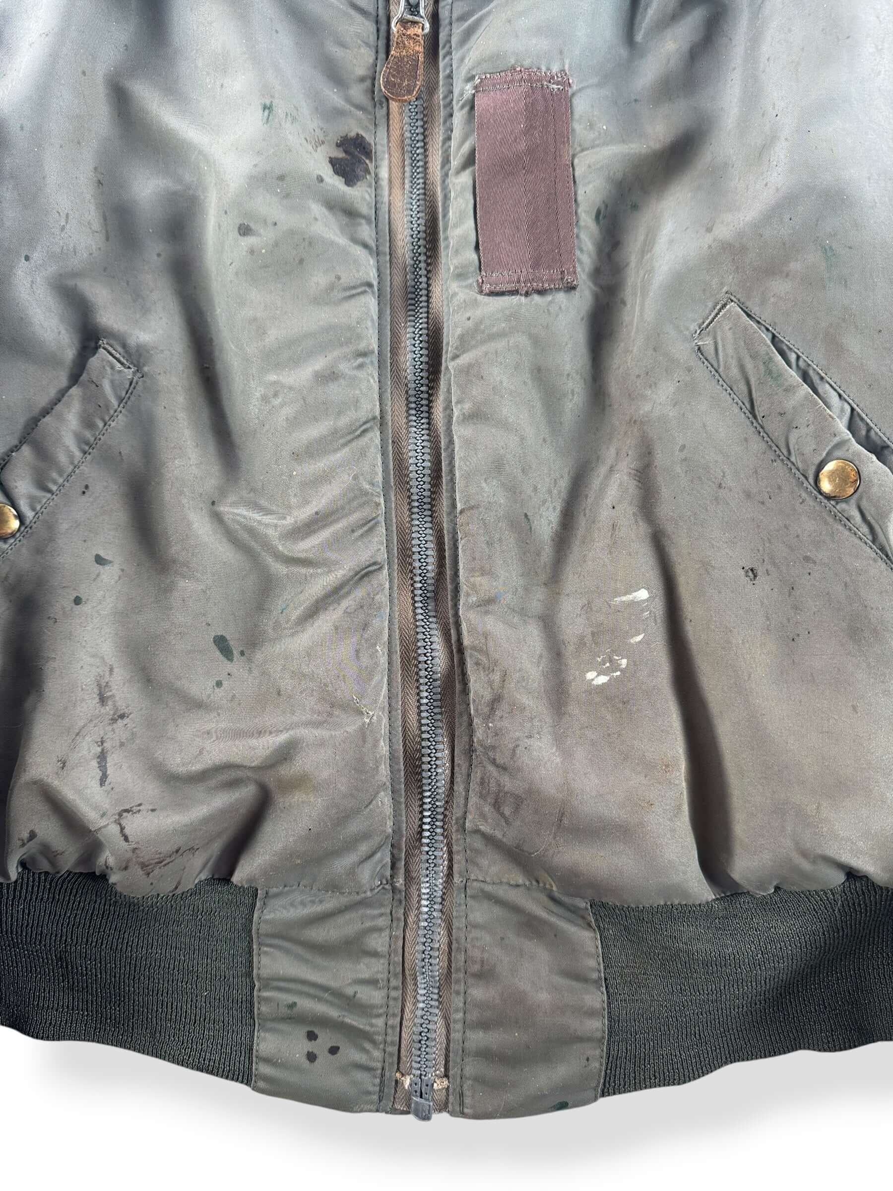 Stains on Vintage B-15 Thrashed Bomber SZ L